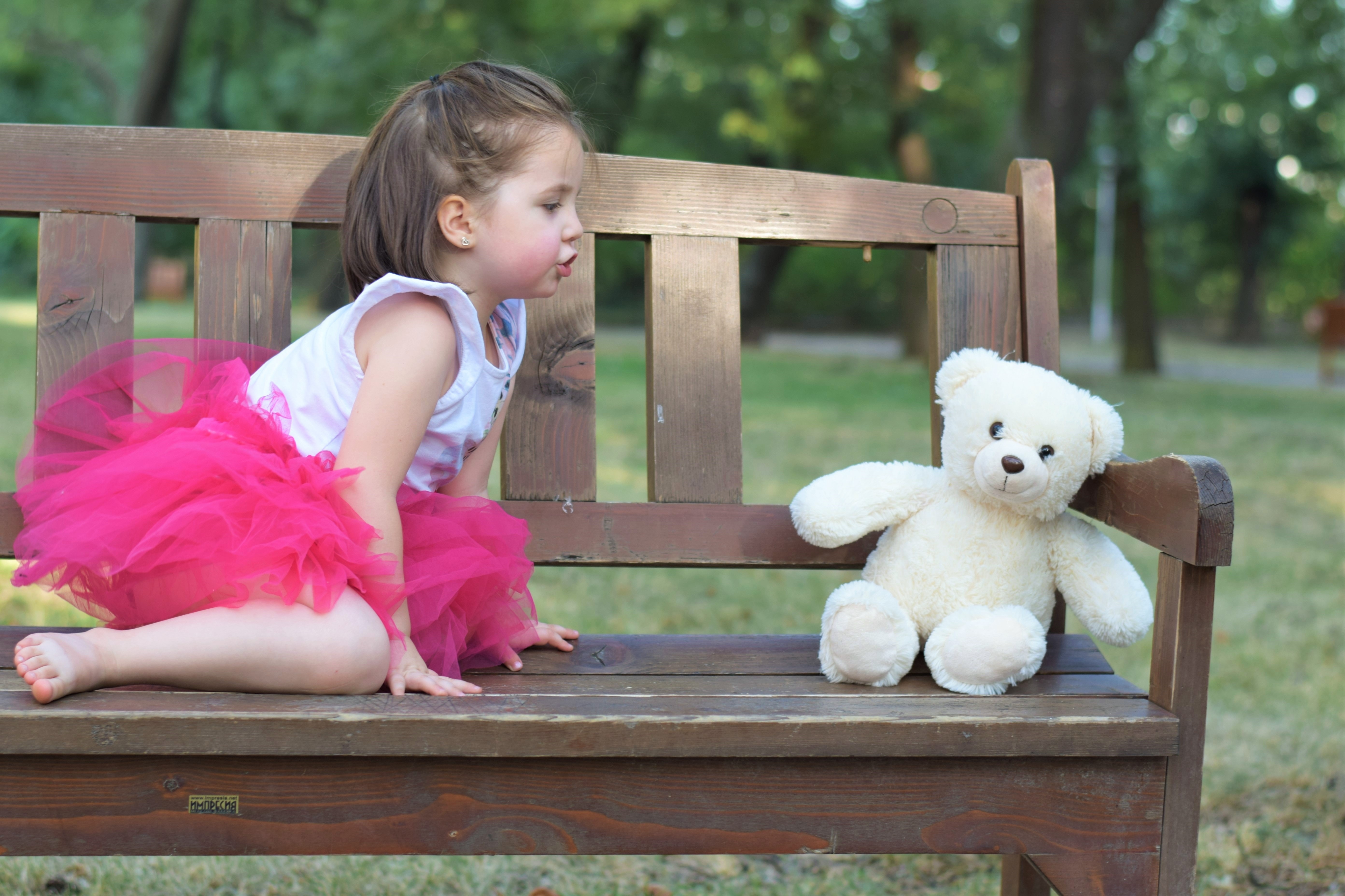 Brown Haired Girl Wearing Pink Tutu Dress Near White Bear Plush Toy, Bench, Child, Cute, Fun, HQ Photo