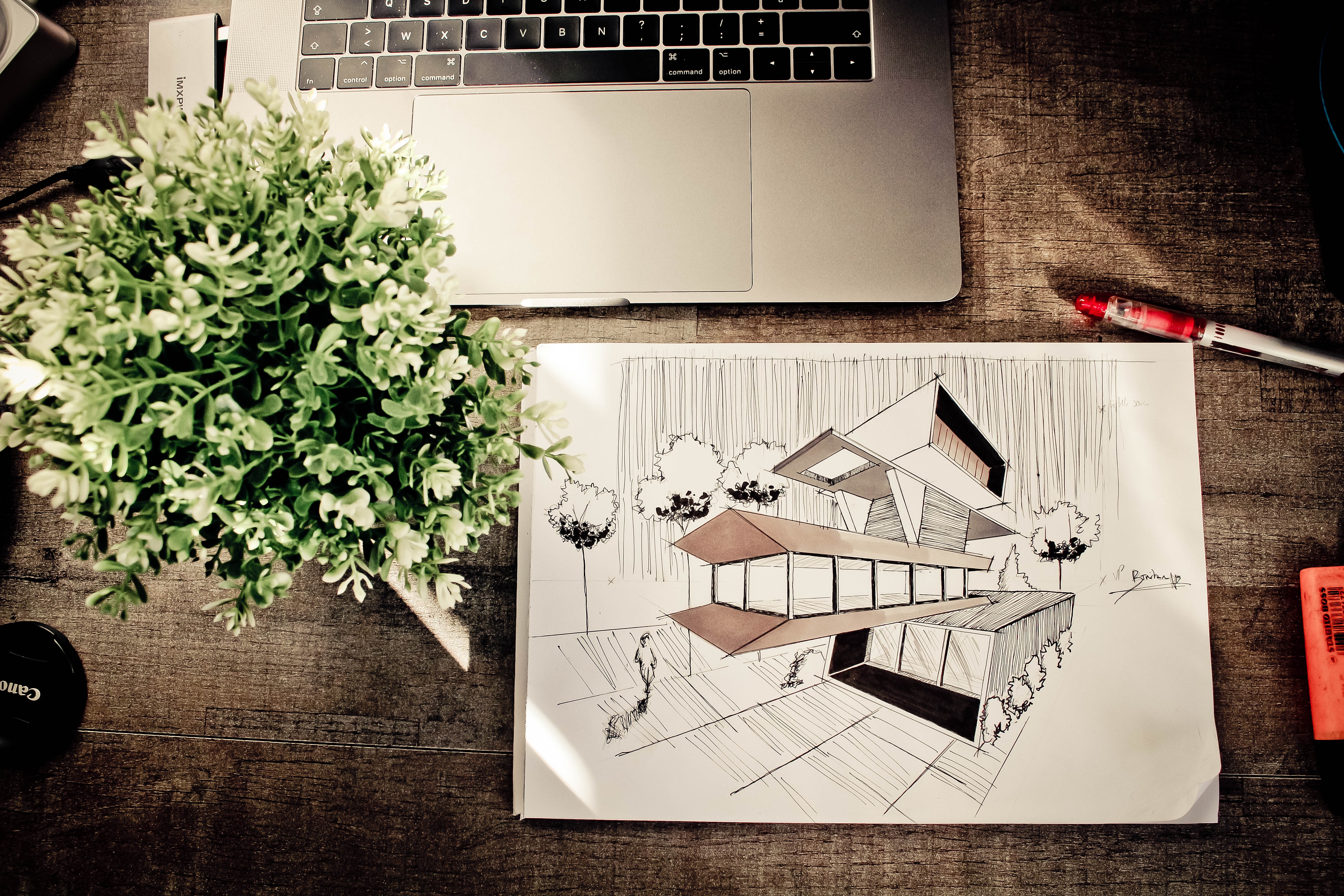 Brown house illustration on brown wooden table photo