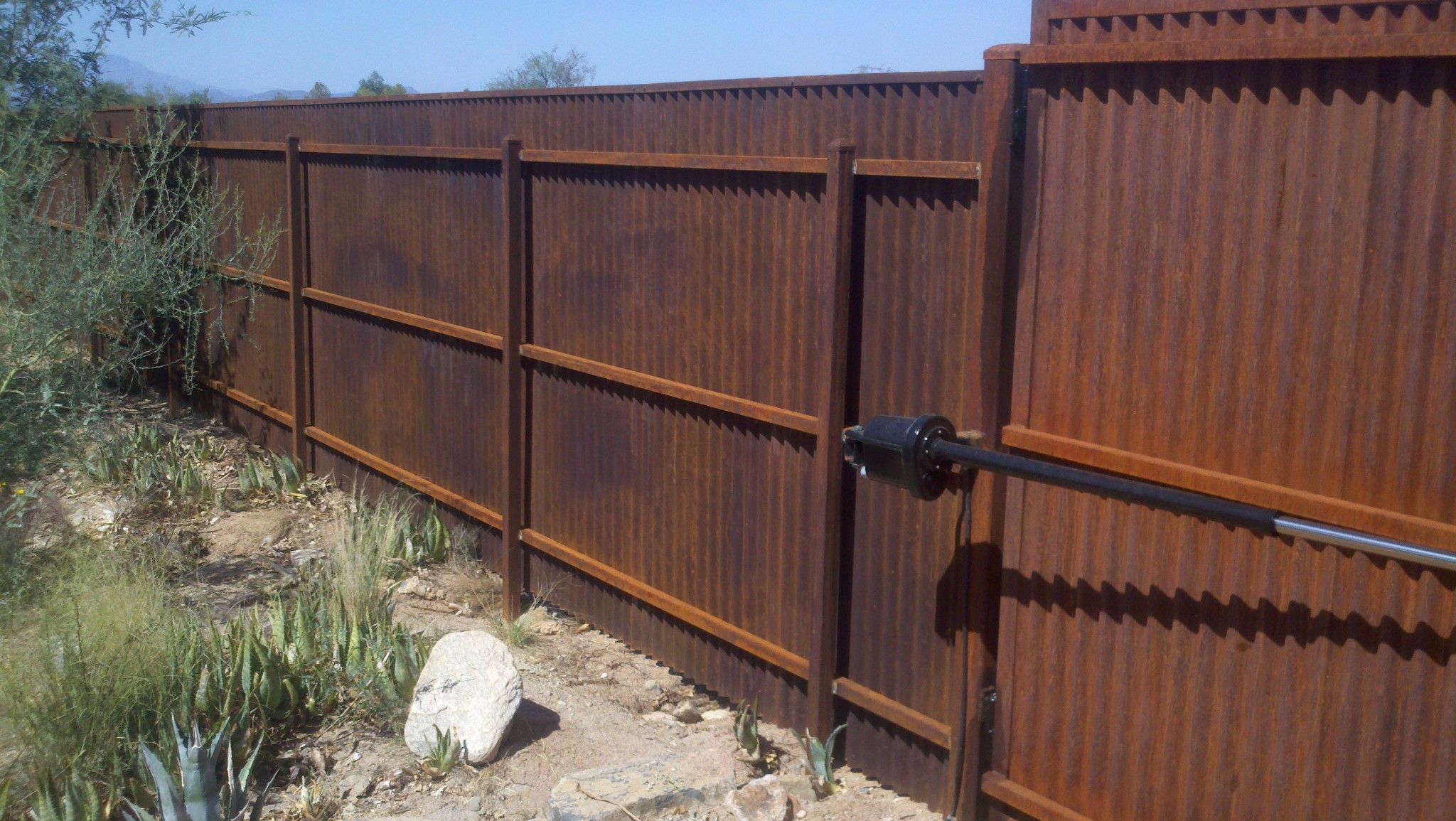 Corrugated Steel Fence and Gates · Affordable Fence & Gates