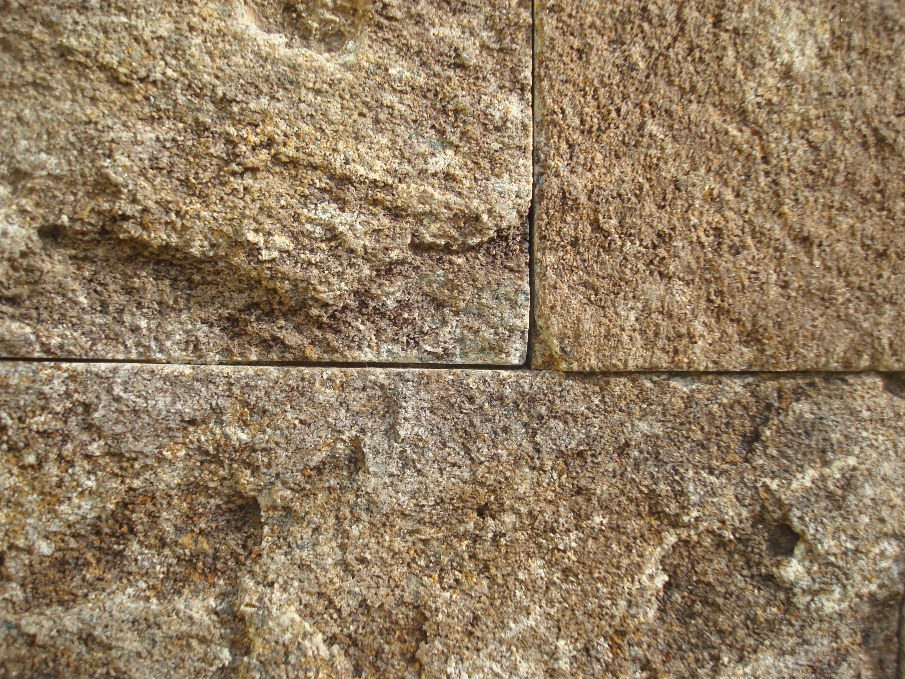 Brown stone wall texture photo