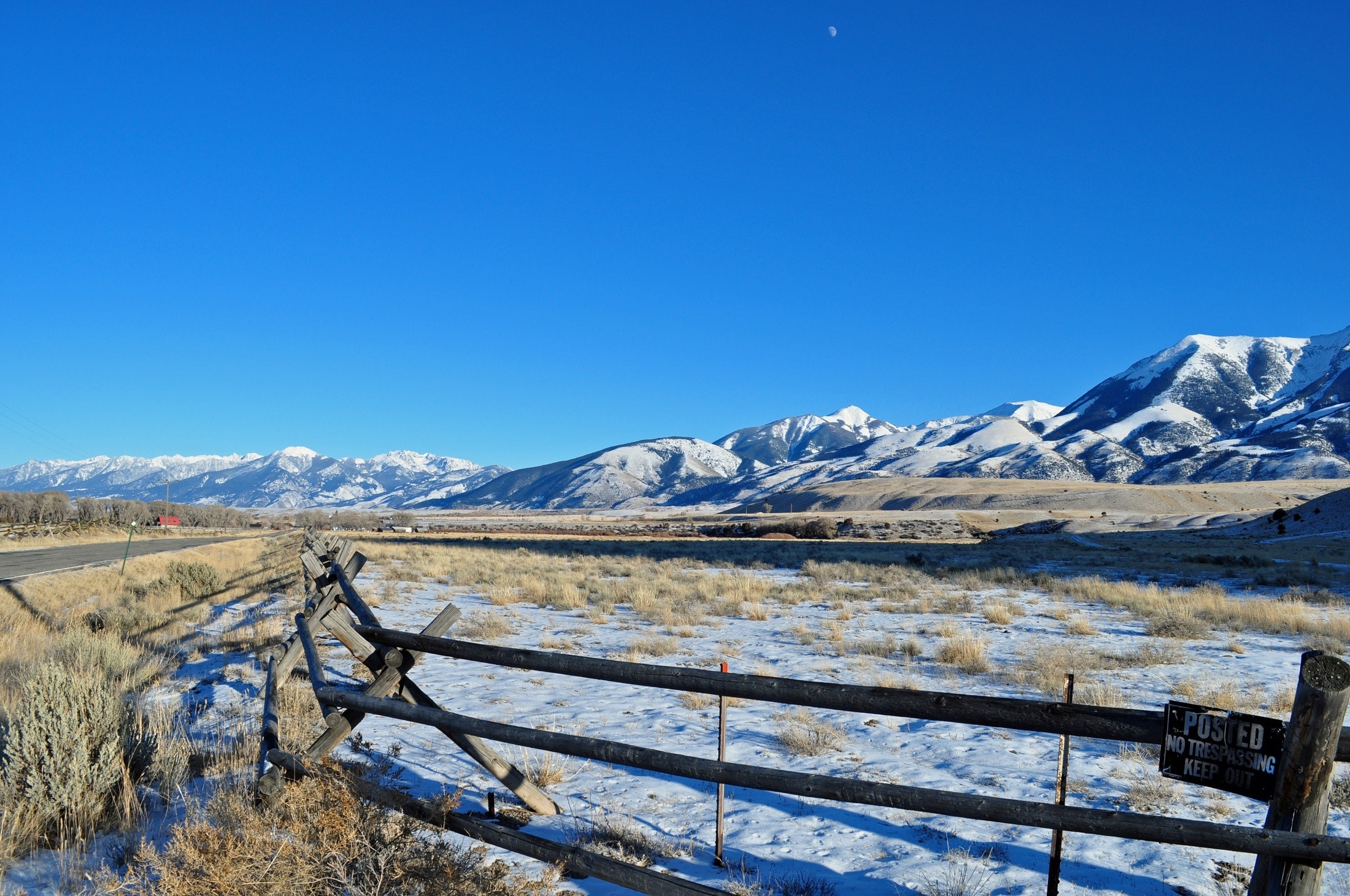 Brown wooden fence in mountain range photo