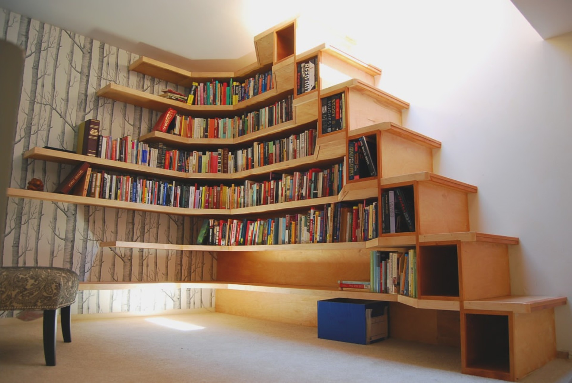 light brown wooden stairs with six floating light brown wooden books ...