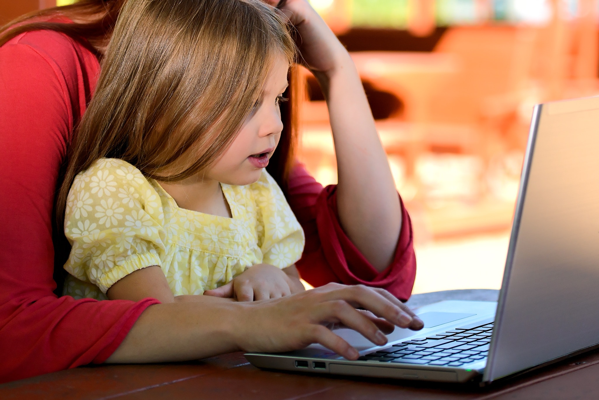 Brunette Woman in Red With Girl in Yellow on Lap Before Laptop, Child, Computer, Cute, Girl, HQ Photo