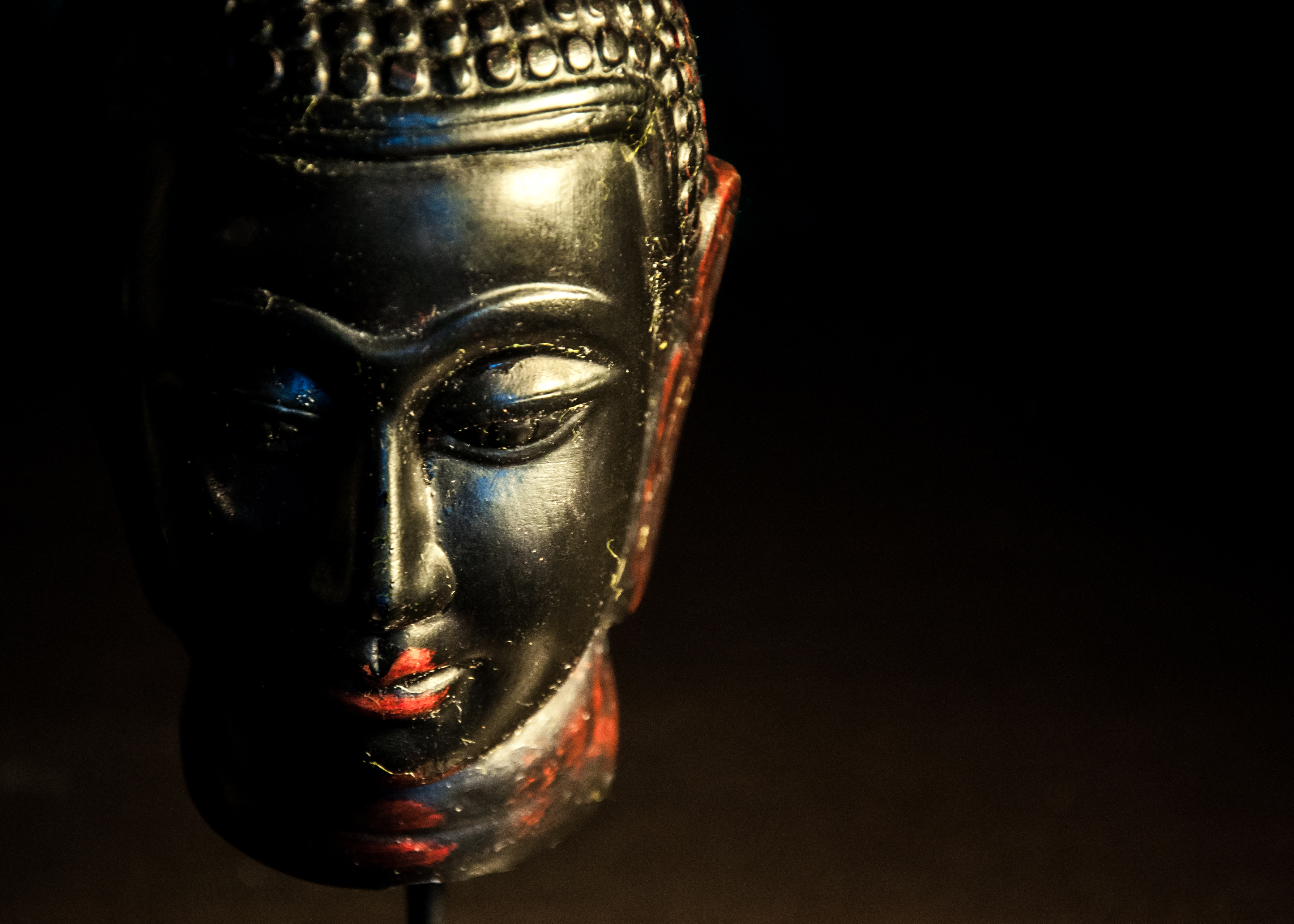 Buddha statue dark background photo