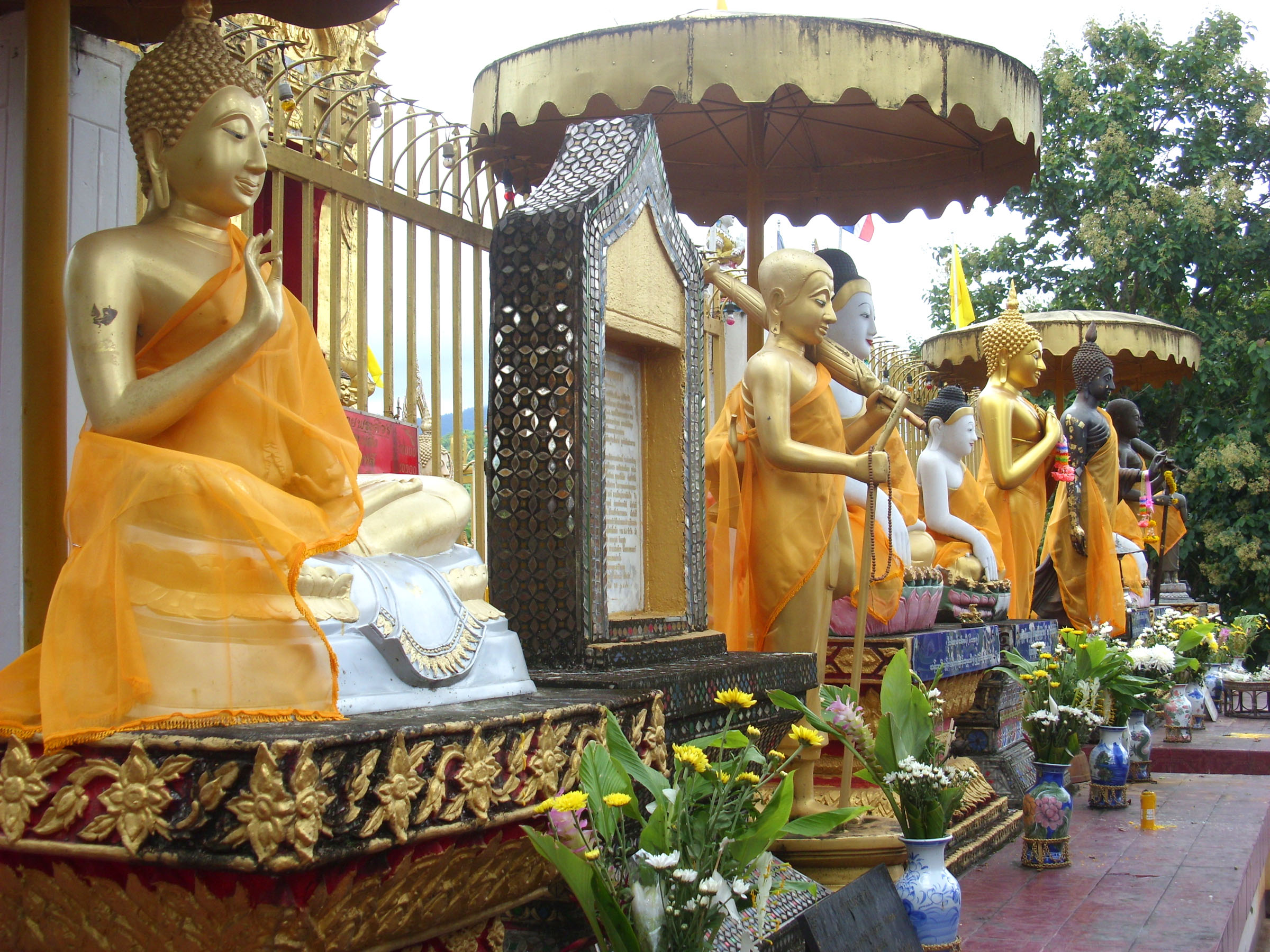 Buddha statues at thai buddhist temple photo