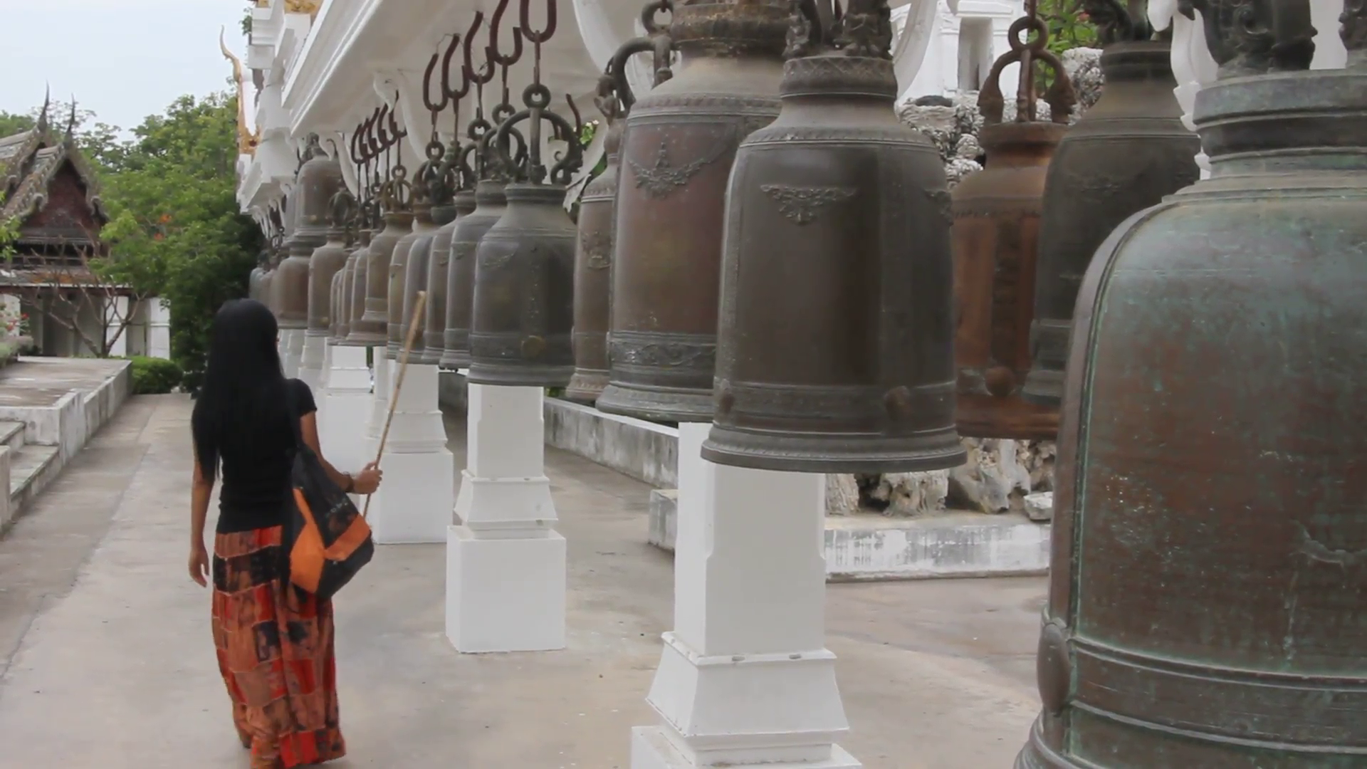Thai woman ringing bells at a buddhist temple Stock Video Footage ...