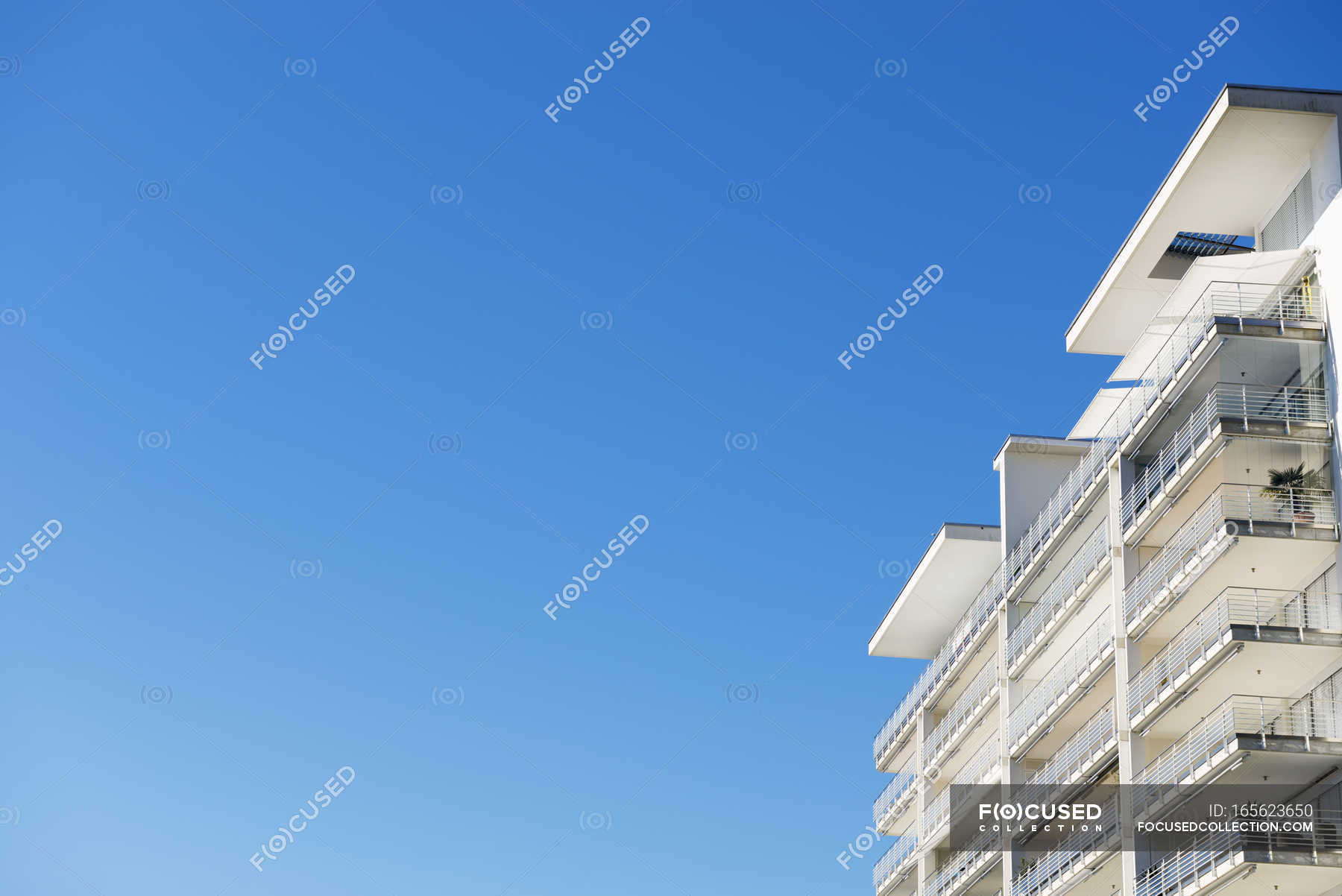 Balconies on building against sky — Stock Photo | #165623650