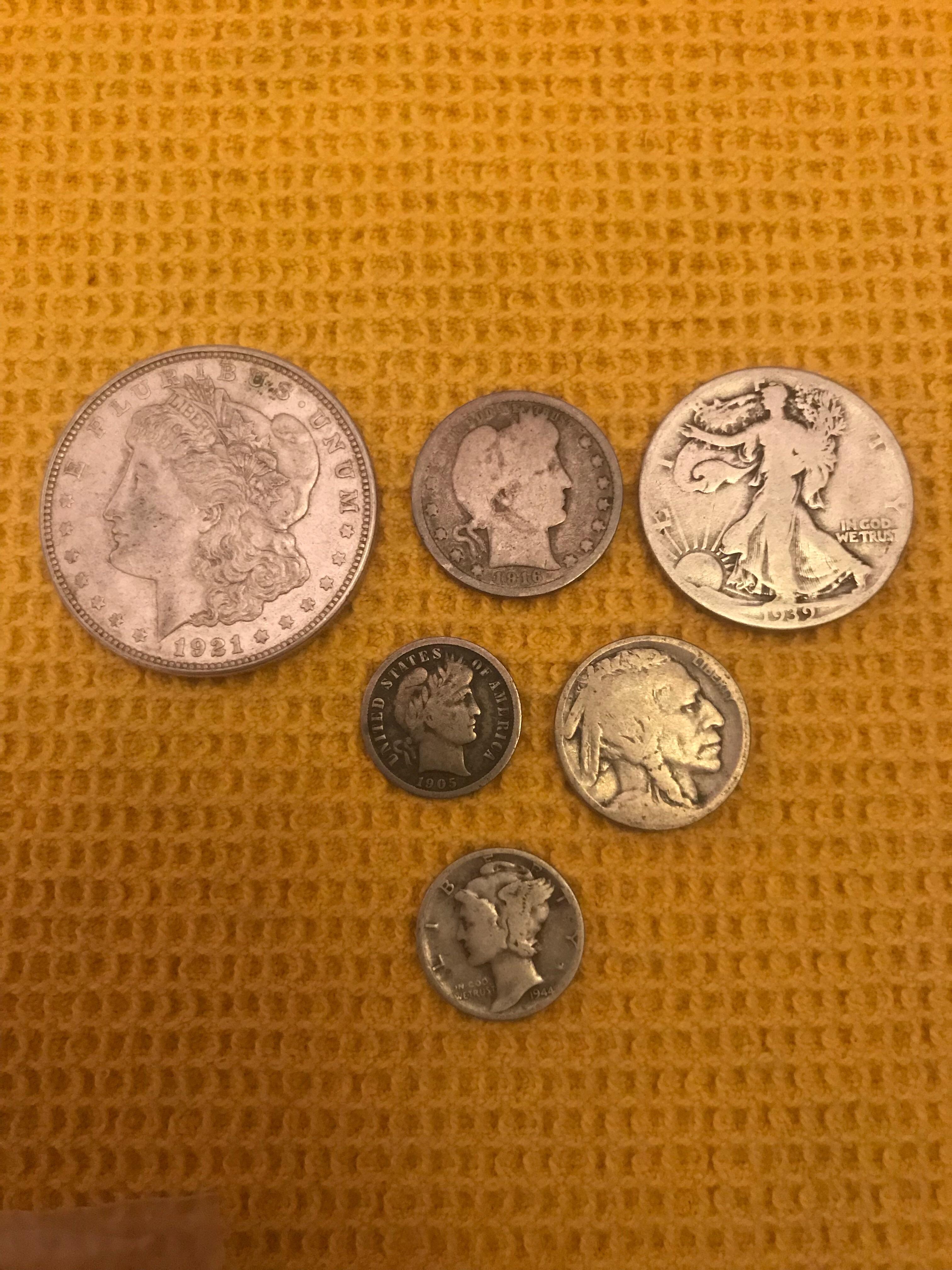 My grandma had a whole bunch of old coins because she worked in a ...