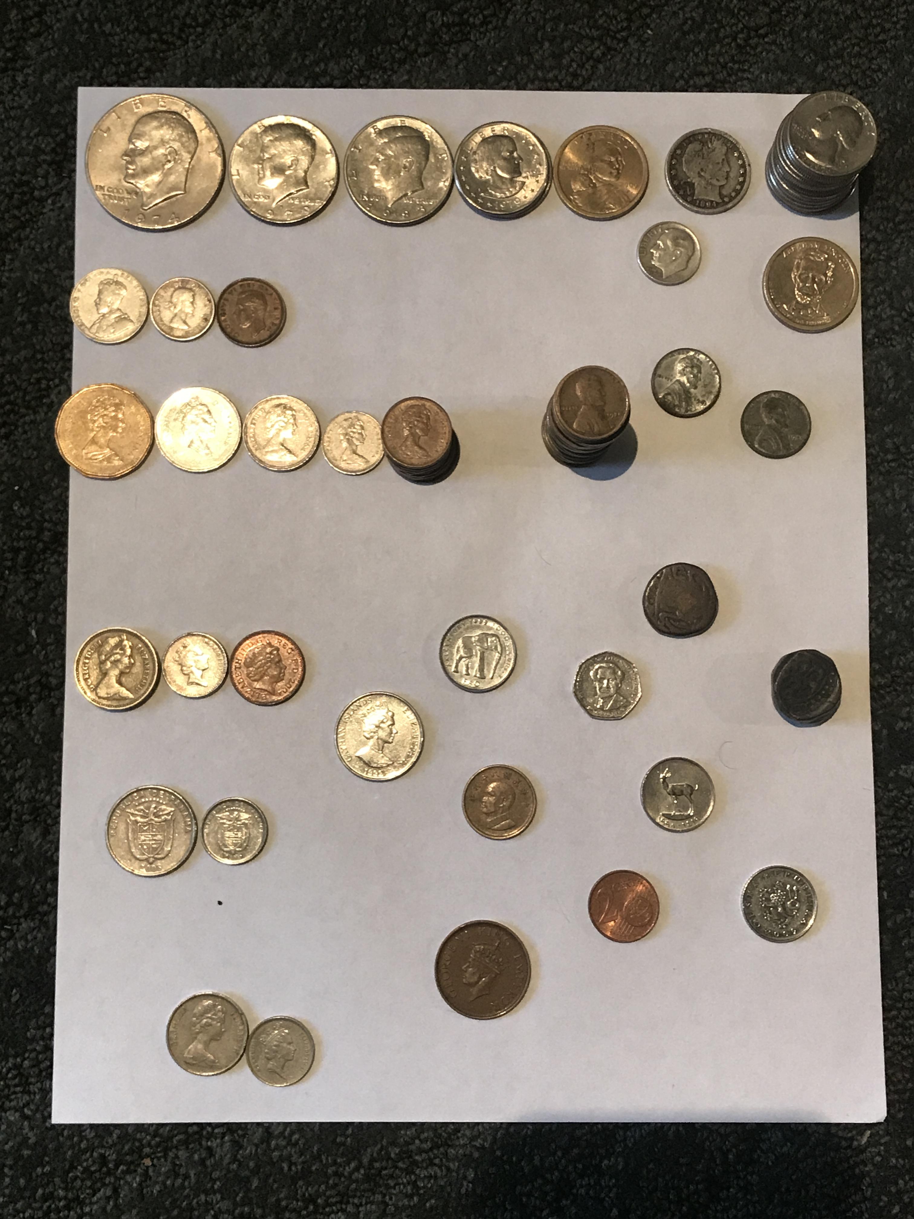A bunch of coins I've found at work. 13 different countries. Many ...