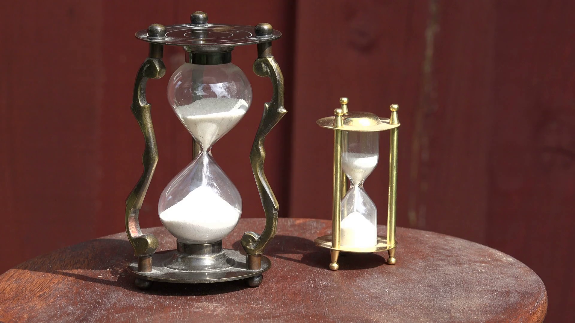 Two hourglasses with running sand on table, 4K Stock Video Footage ...