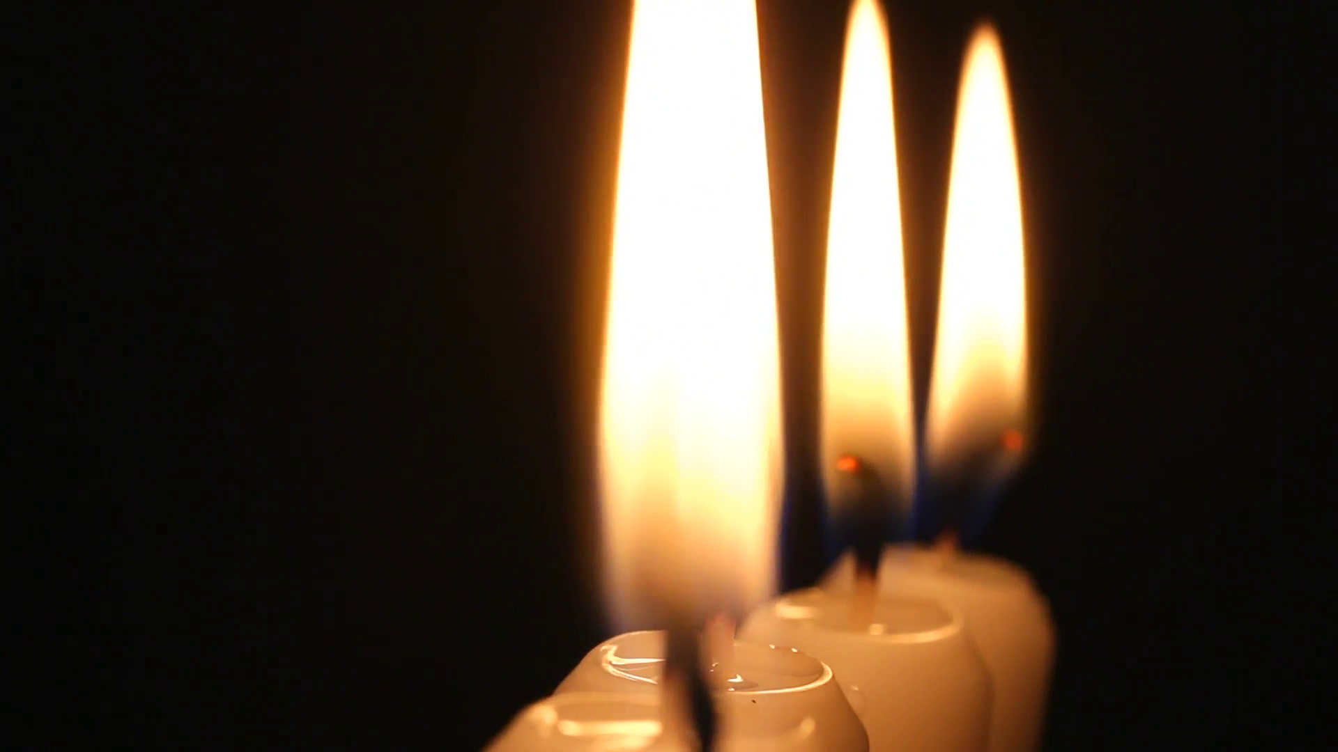 Moving candle light. A rotating line of burning candles. Stock Video ...