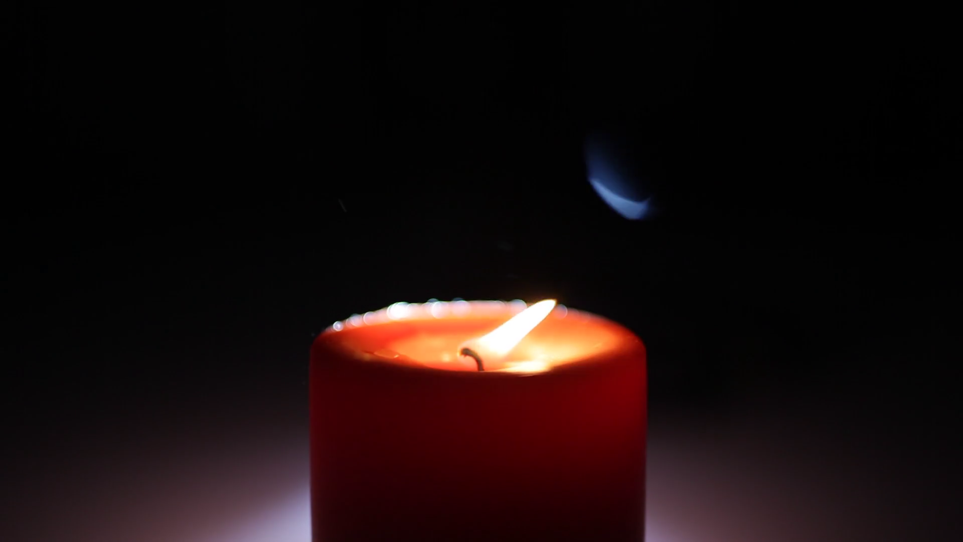 Burning candle in the dark. Backlight illumination. Stock Video ...