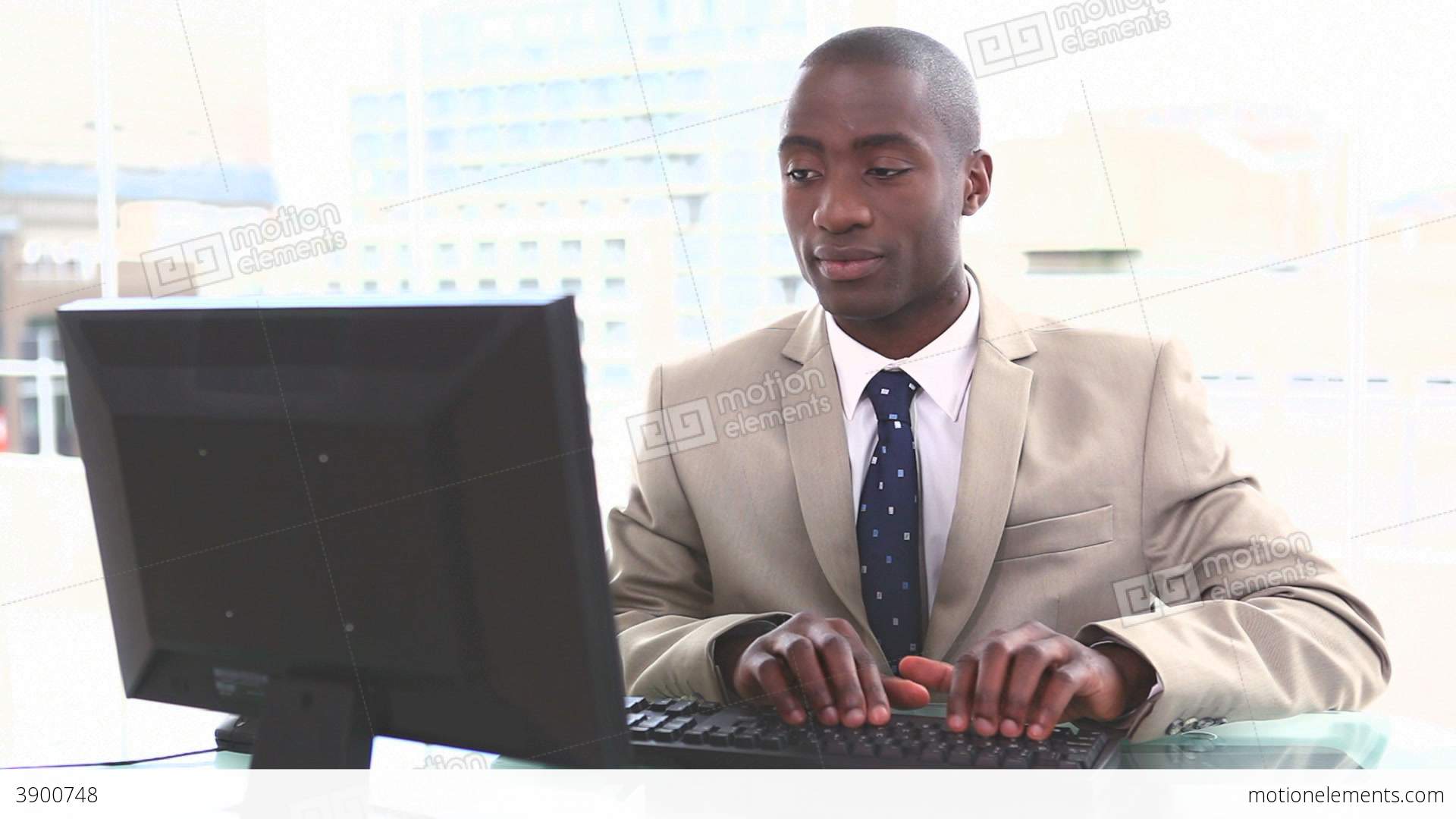 Black Businessman Typing On A Keyboard Stock video footage | 3900748