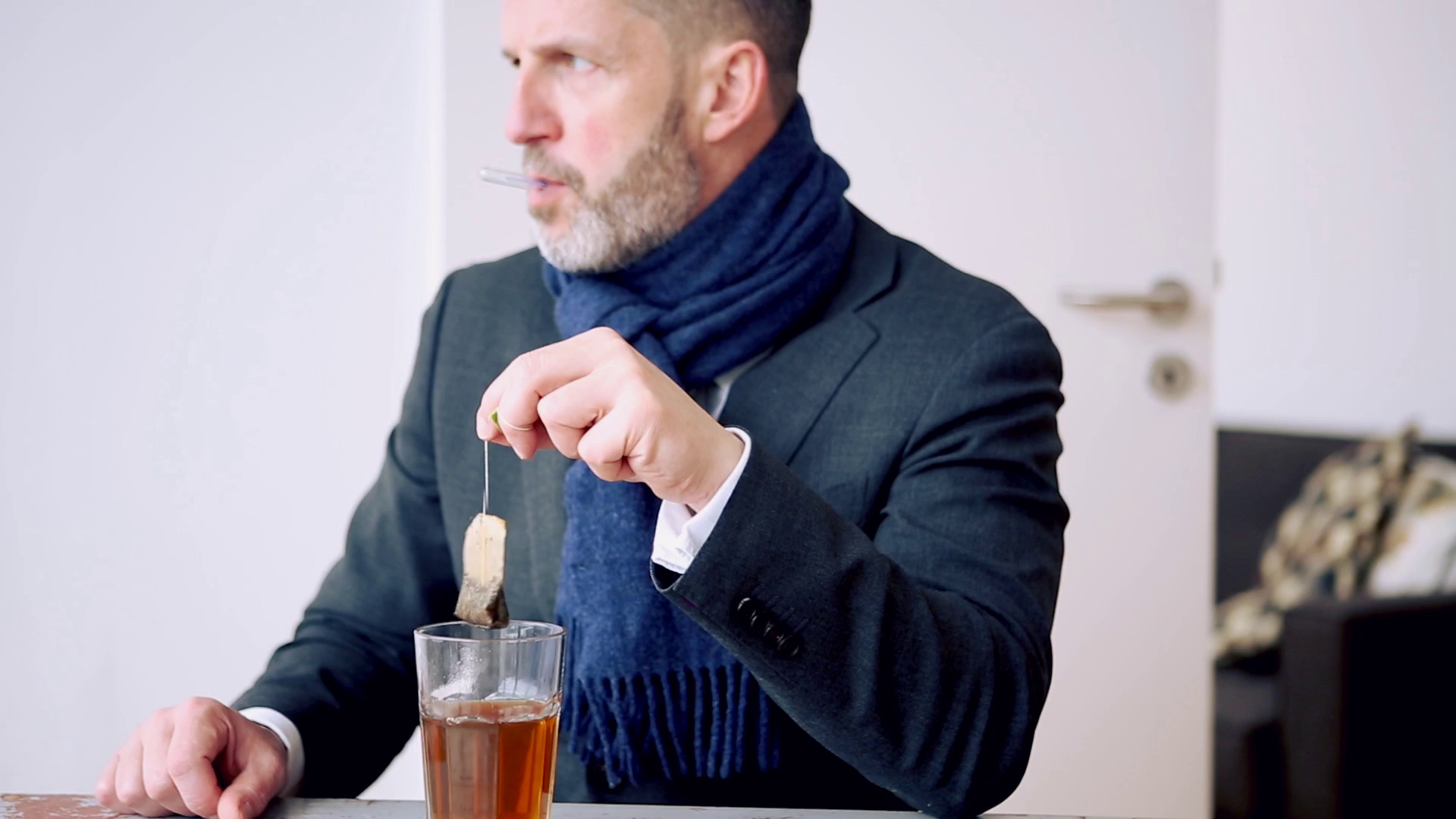 Cinemagraph of businessman with a cold drinking tea at table Stock ...