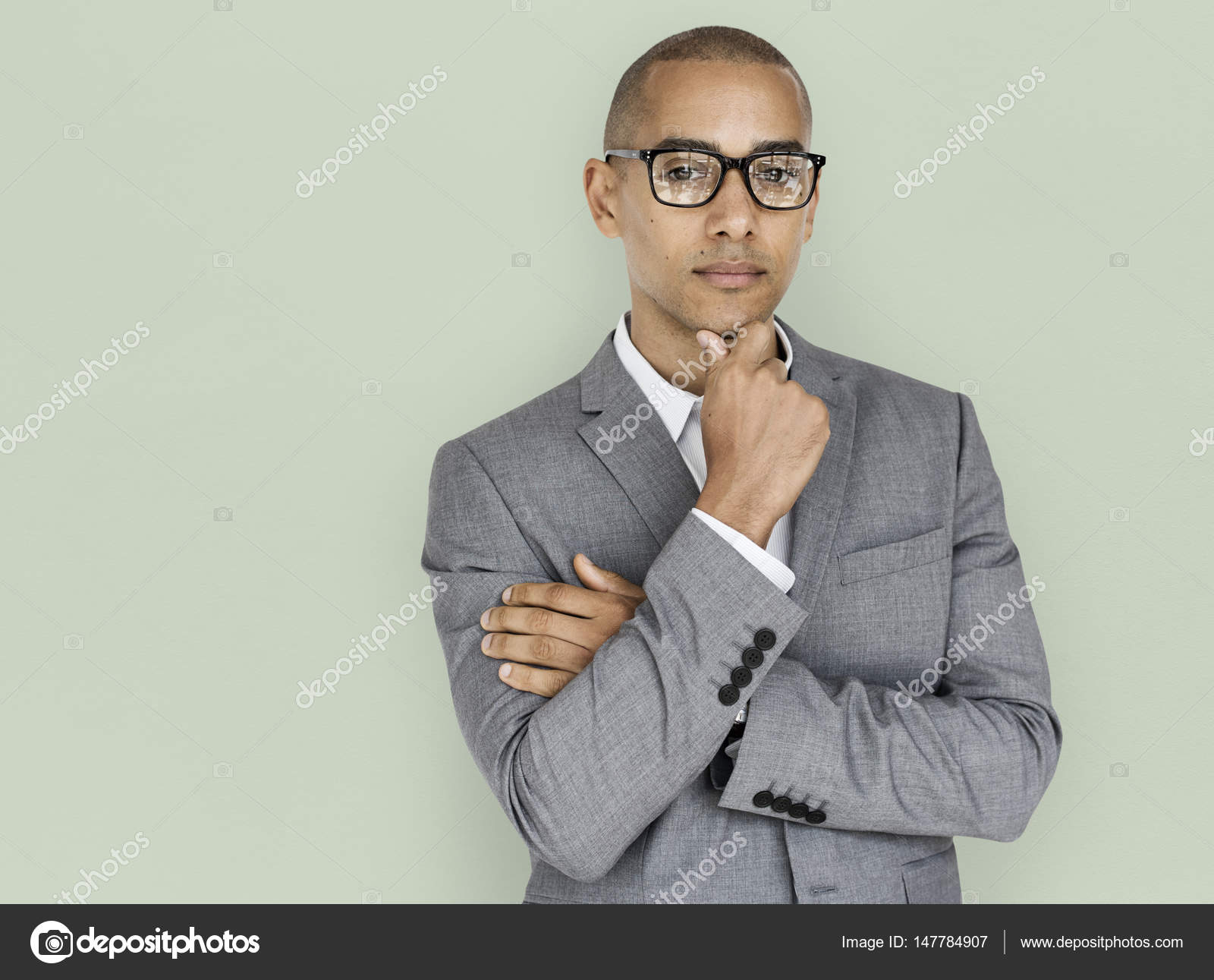 Businessman posing in studio — Stock Photo © Rawpixel #147784907