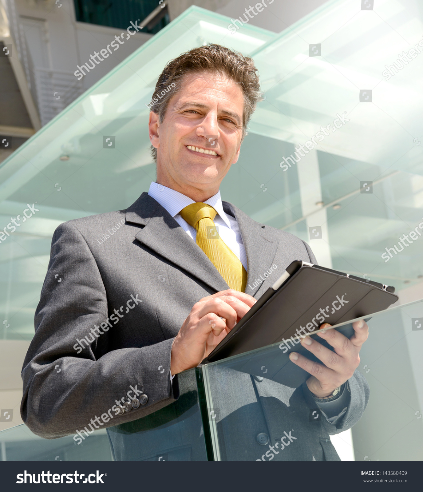 Businessman Posing Outdoors Tablet Stock Photo 143580409 - Shutterstock