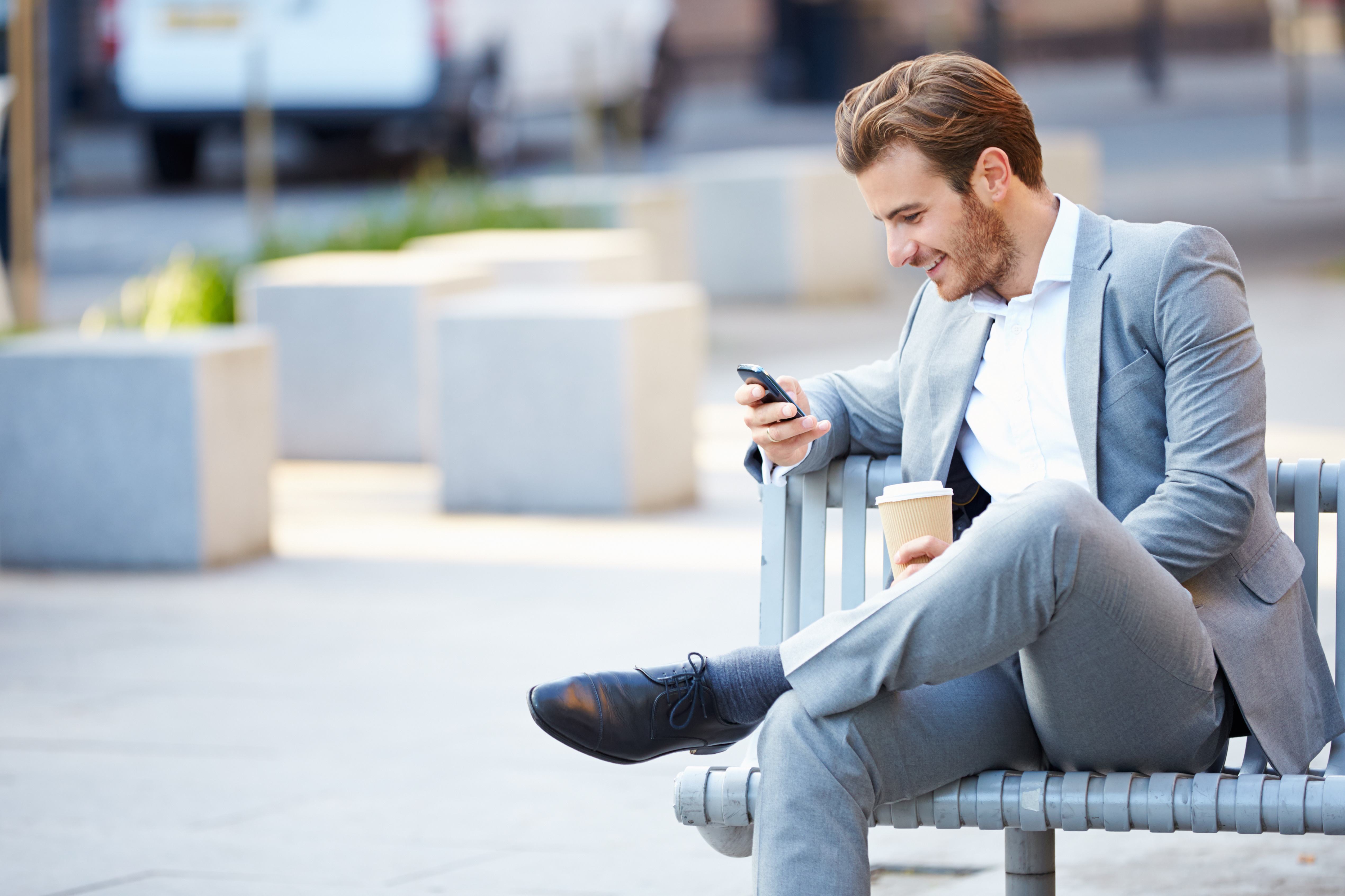Businessman On Park Bench With Coffee Using Mobile Phone – Wireless ...