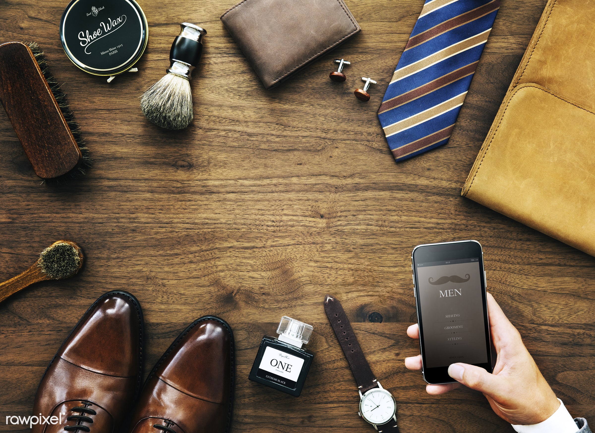 Flatlay view of a businessman's collection of objects used daily