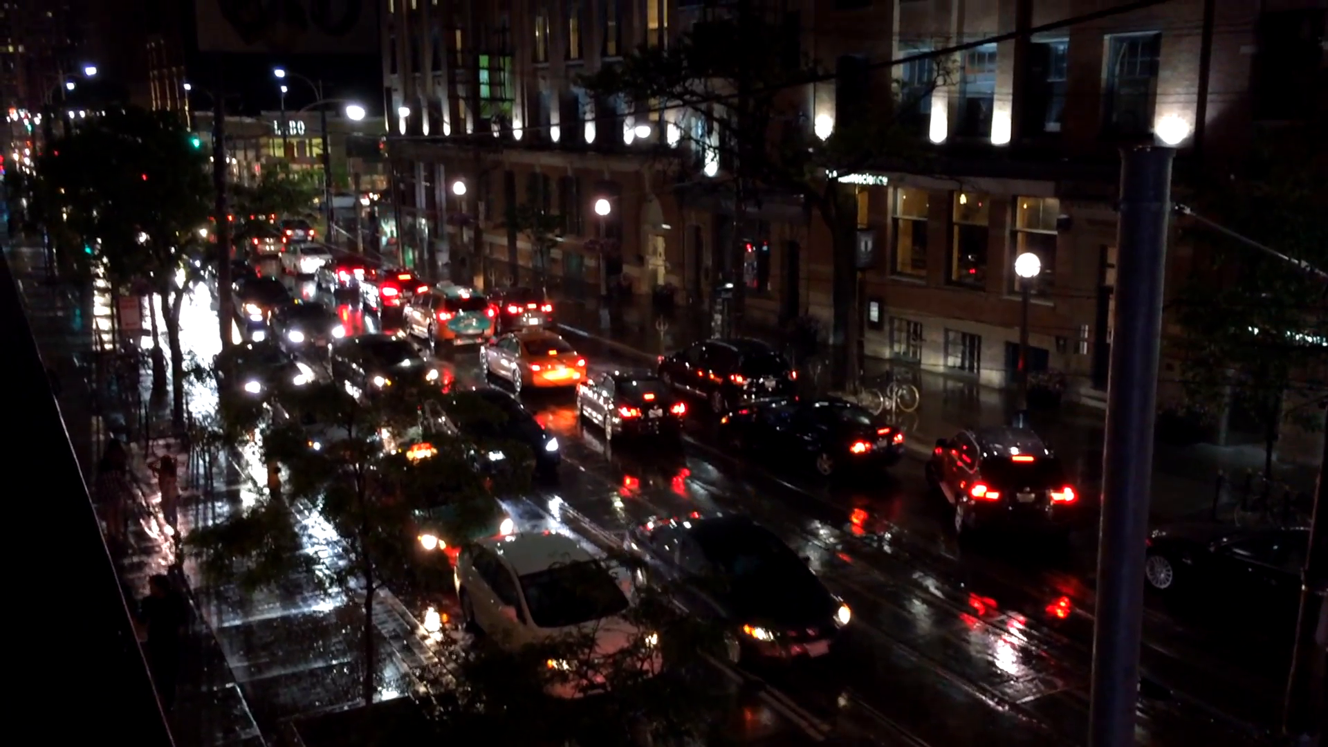 Busy city street traffic at night in the rain Stock Video Footage ...