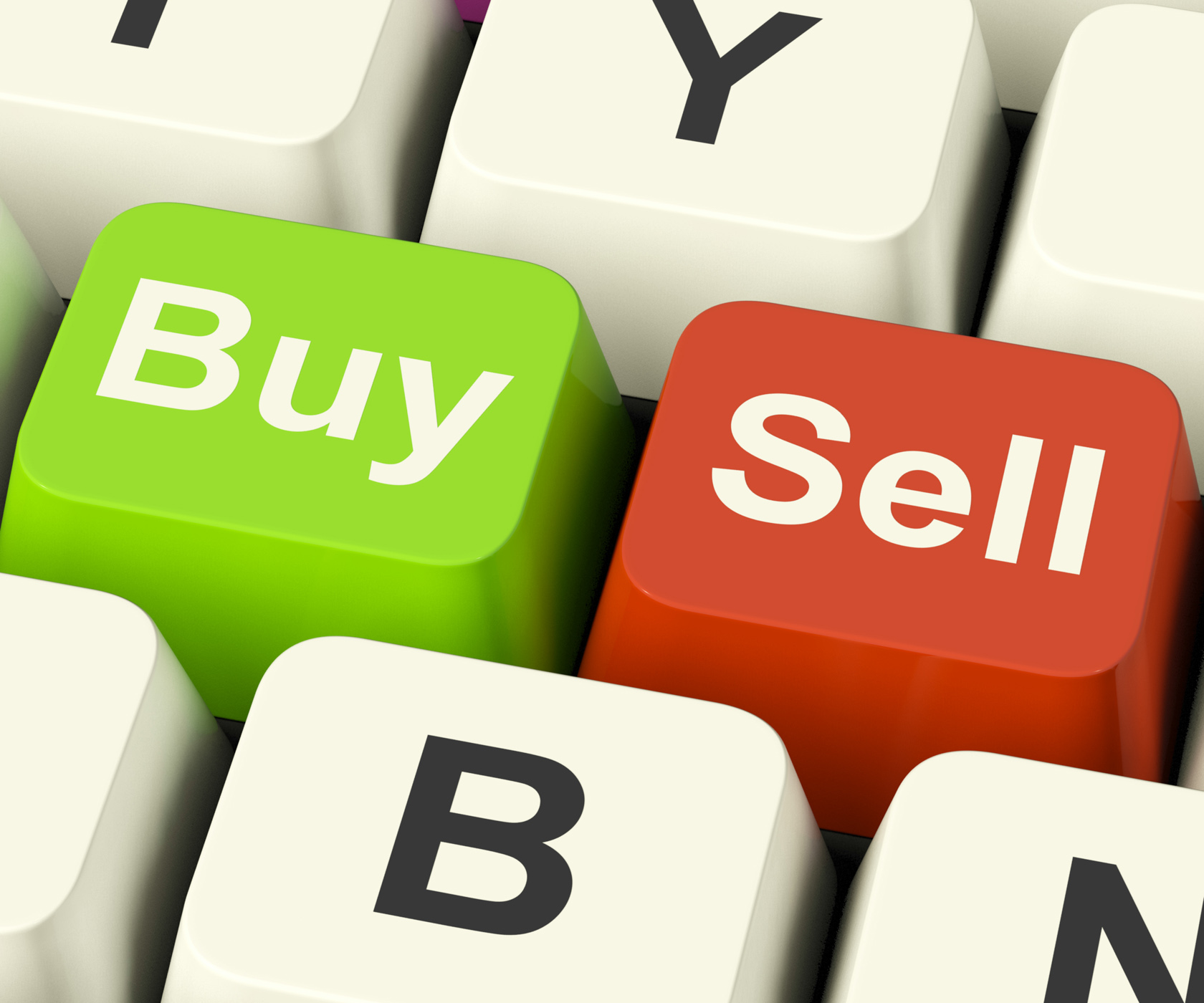 Buy and sell keys representing business trade or stocks online photo