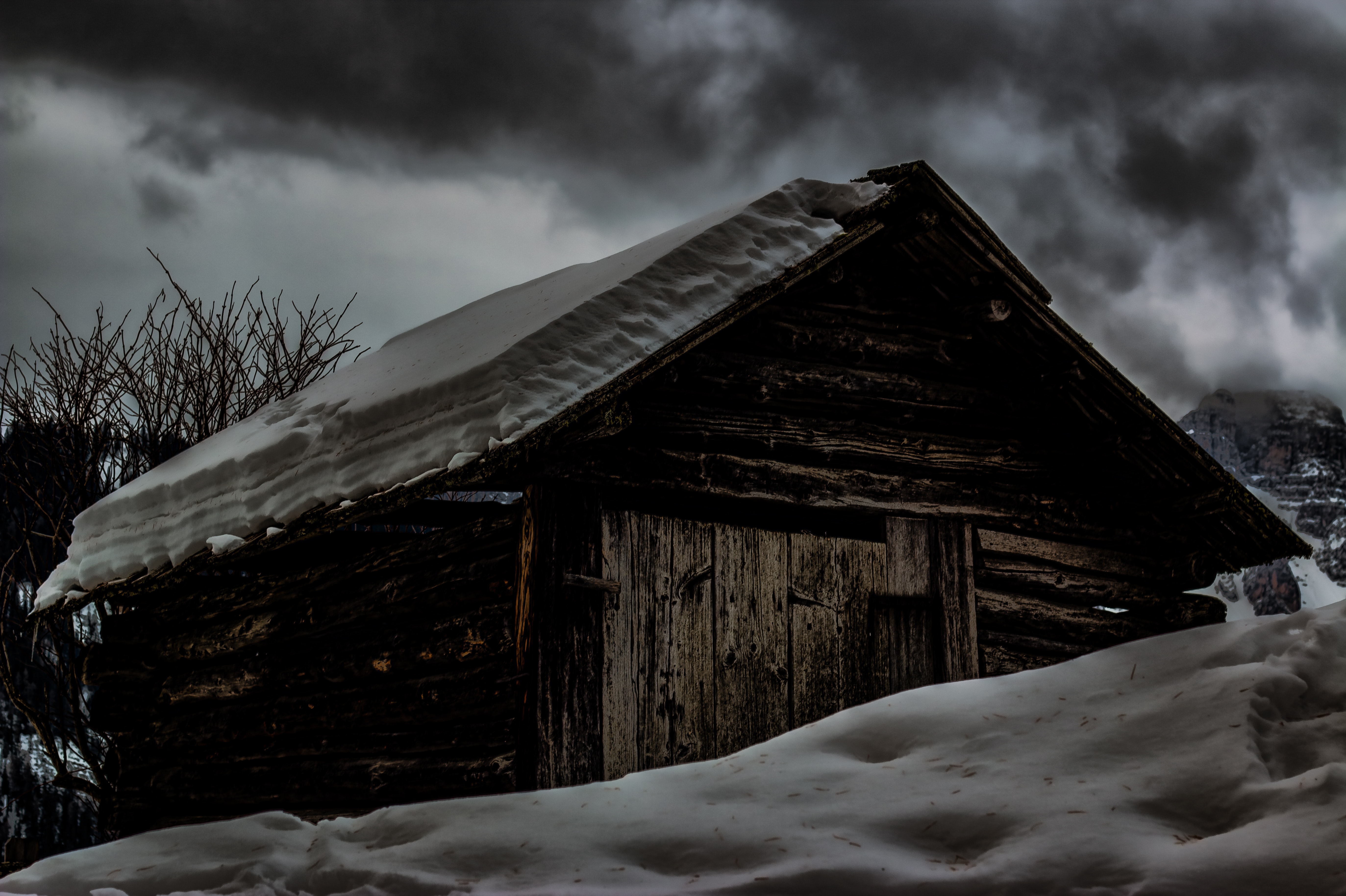 Cabin covered by snow photo
