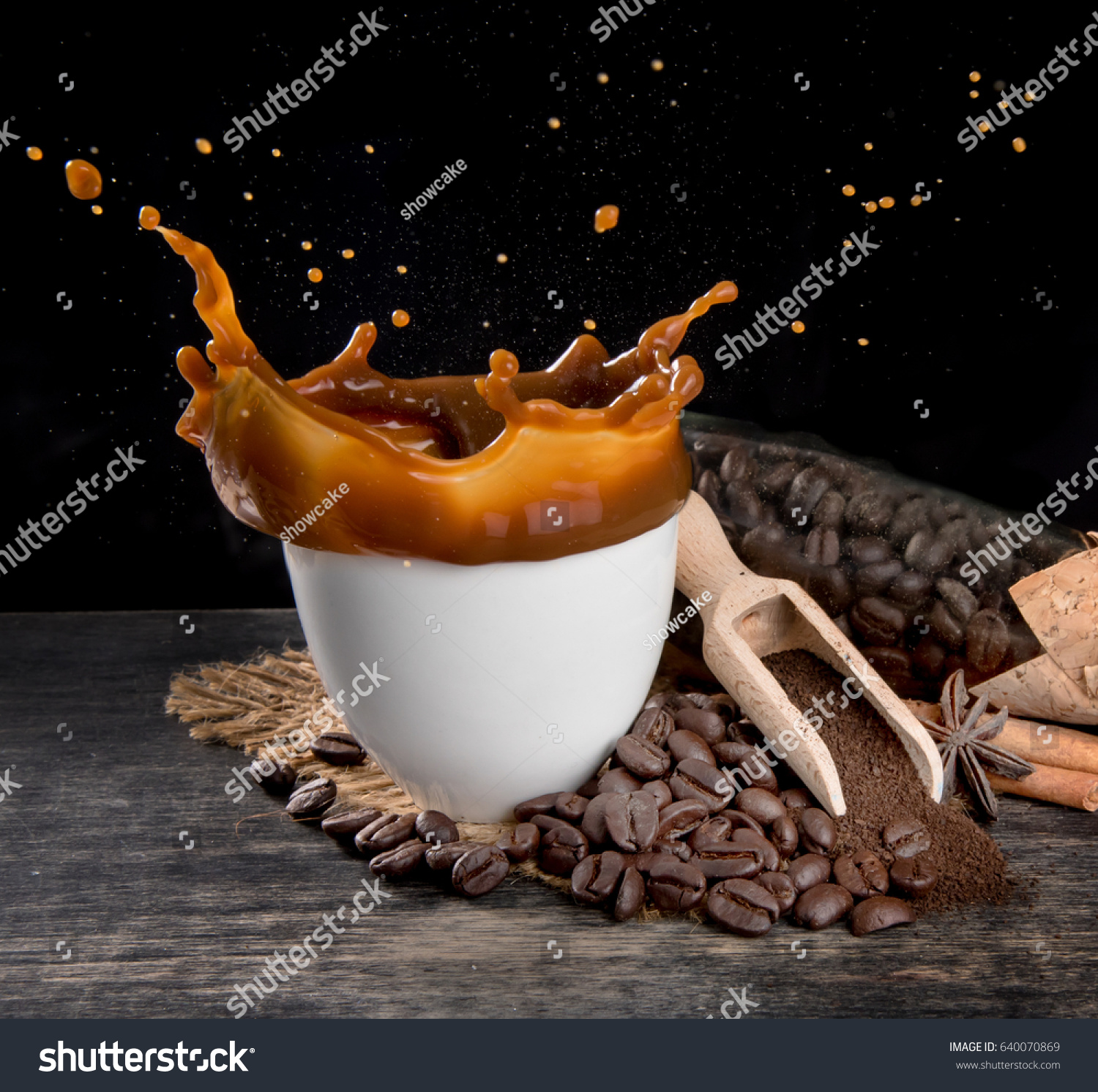 Coffee Splash Coffee Beans On Table Stock Photo (Edit Now)- Shutterstock