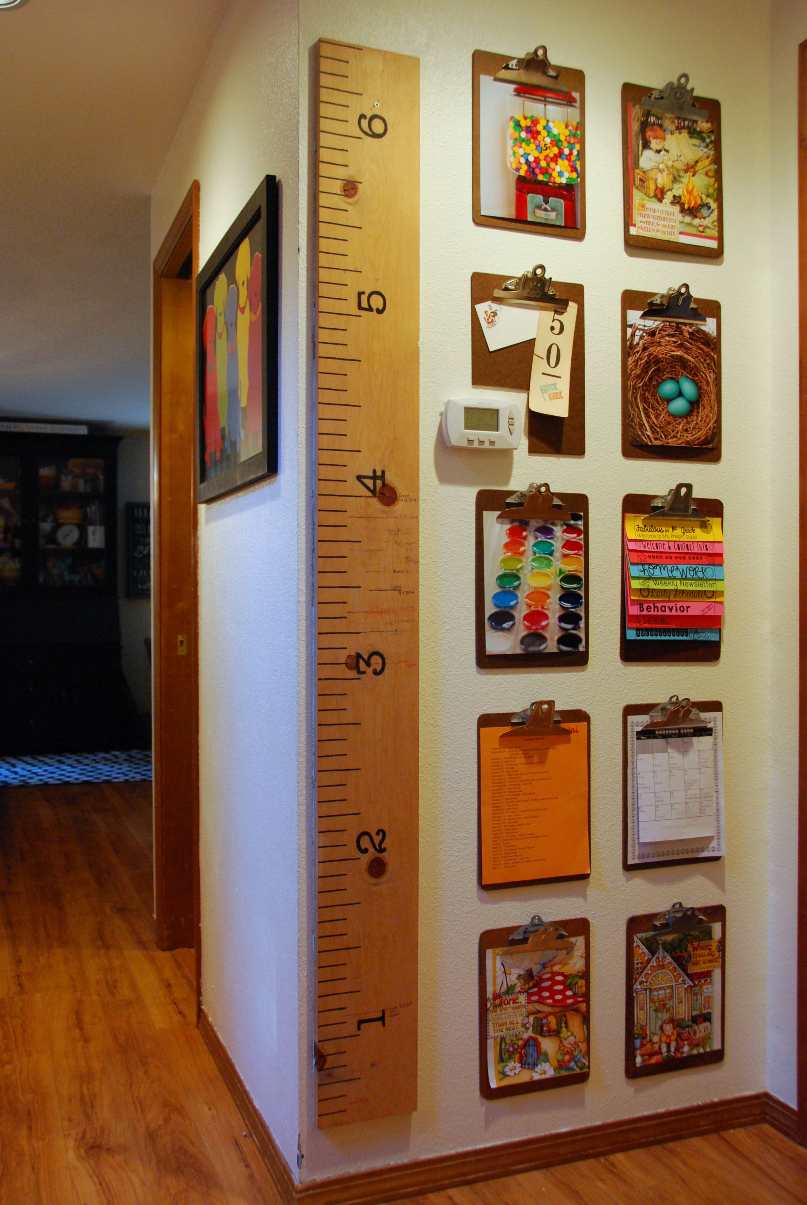 thrifted clipboards used to create a gallery wall for kids artwork ...