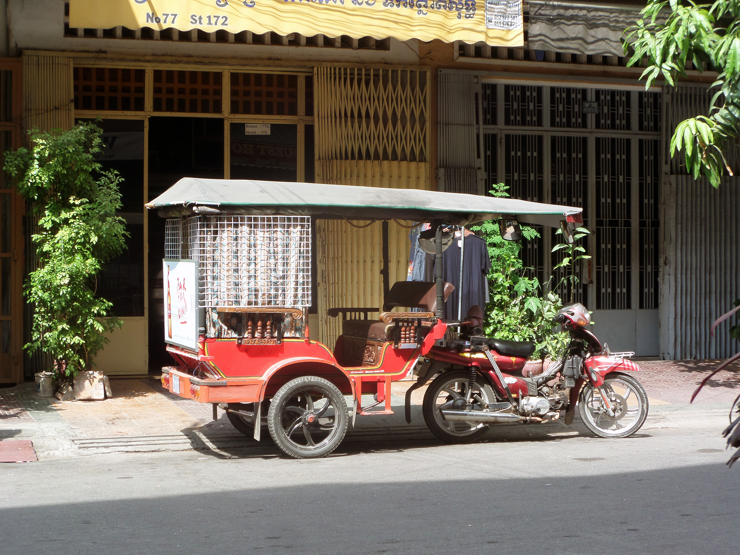 Cambodian tuk tuk taxi photo