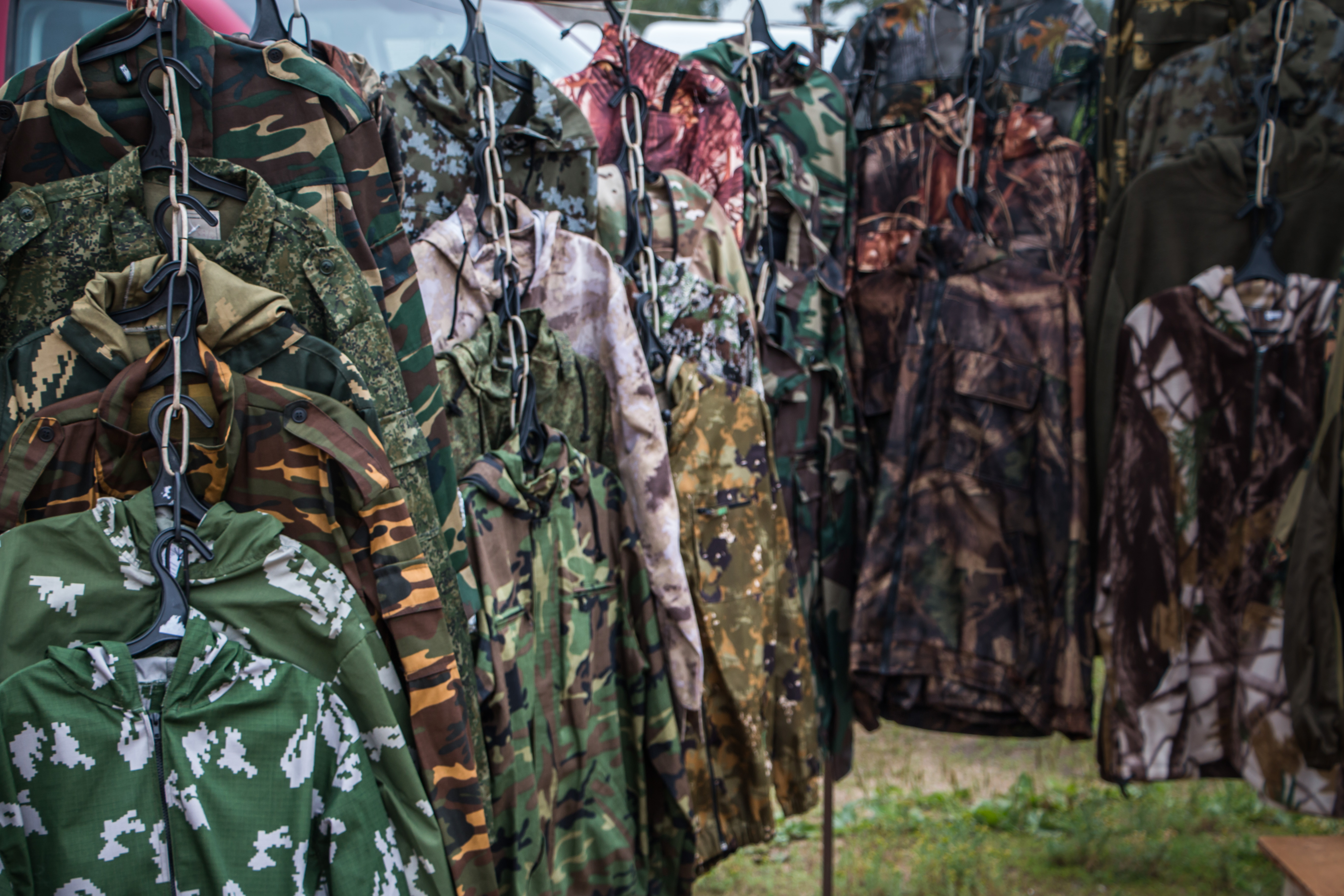 Camouflage clothes stand photo