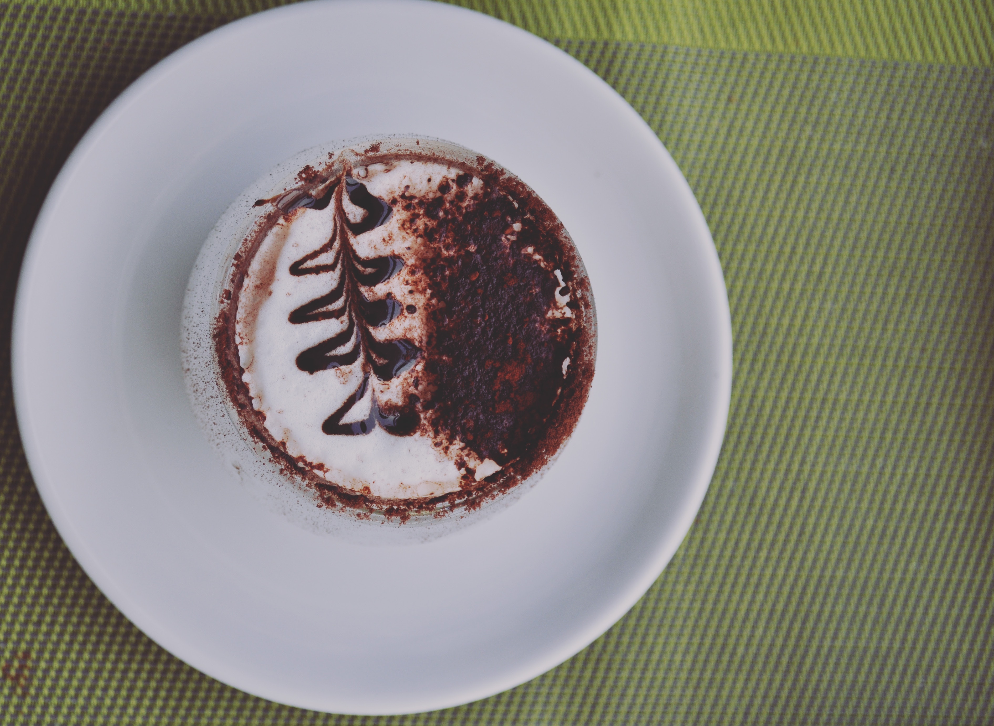 Cappuccino espresso cake on white ceramic plate photo