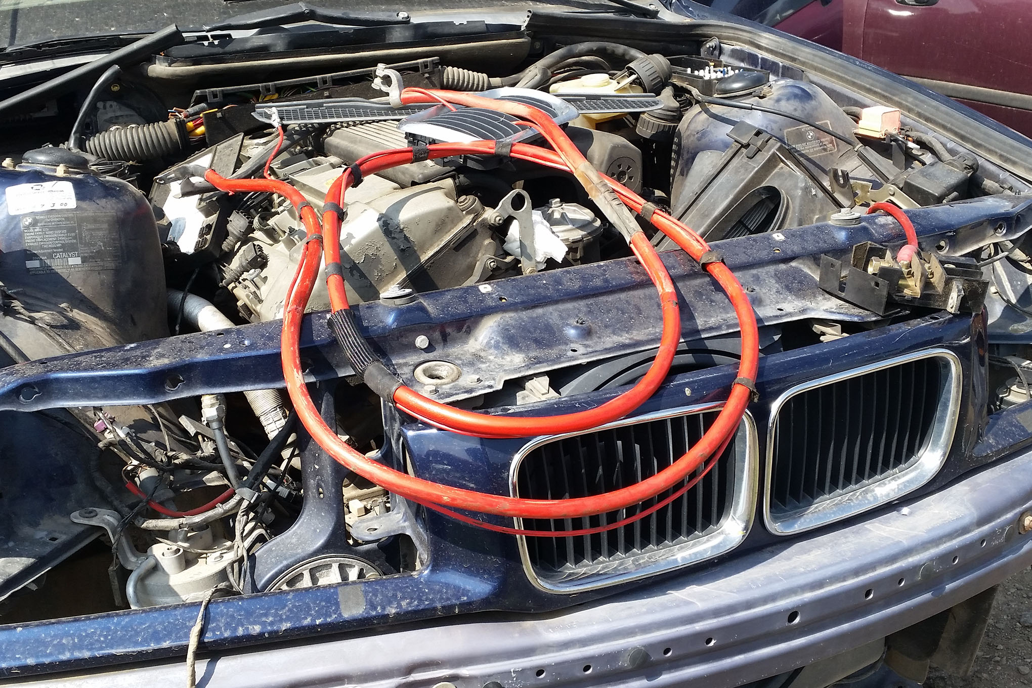 Want a Trunk-Mounted Battery Cable, Cheap? Go Junkyard Shopping ...