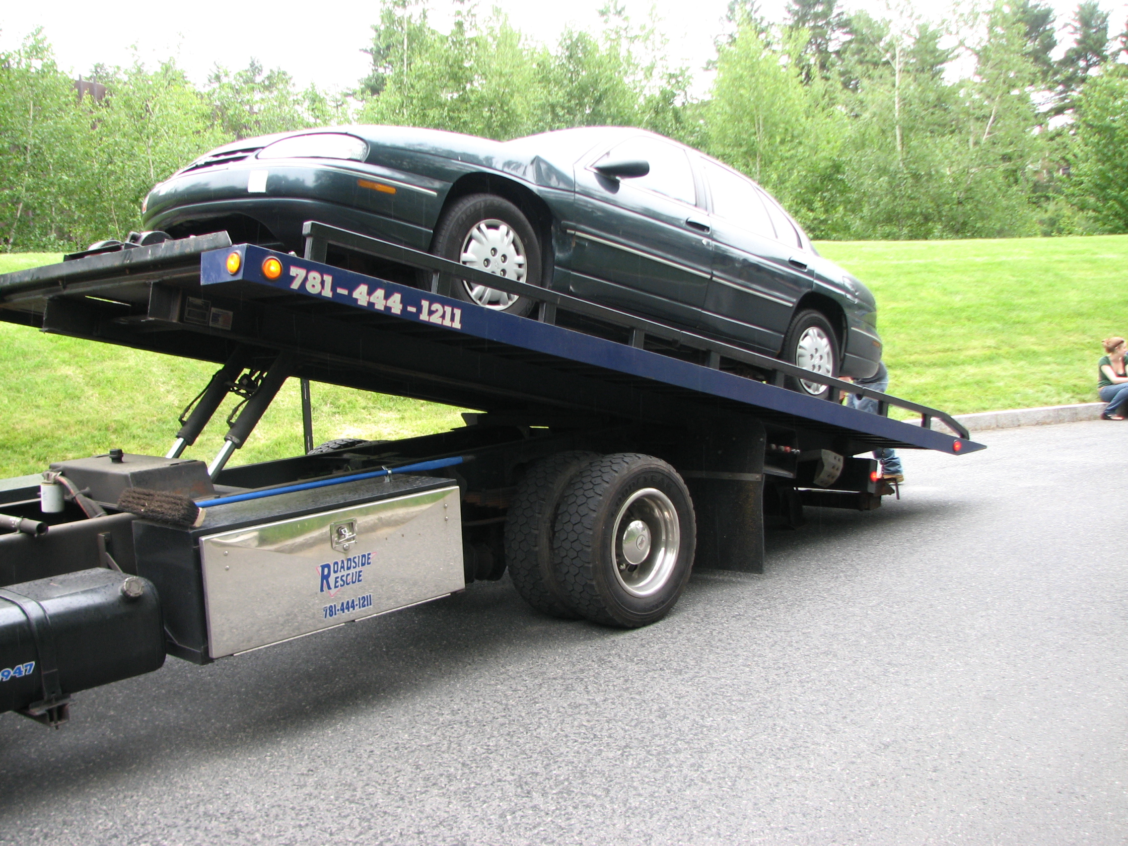 Car on tow truck photo
