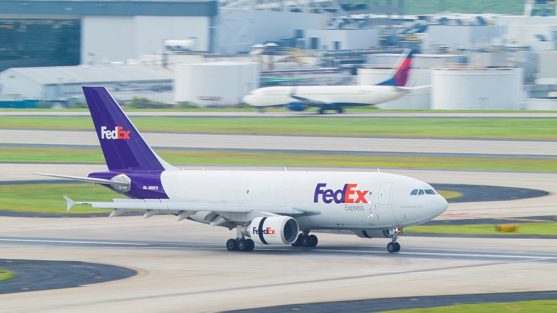 FedEx cargo plane airport runway arrival Stock Video Footage ...