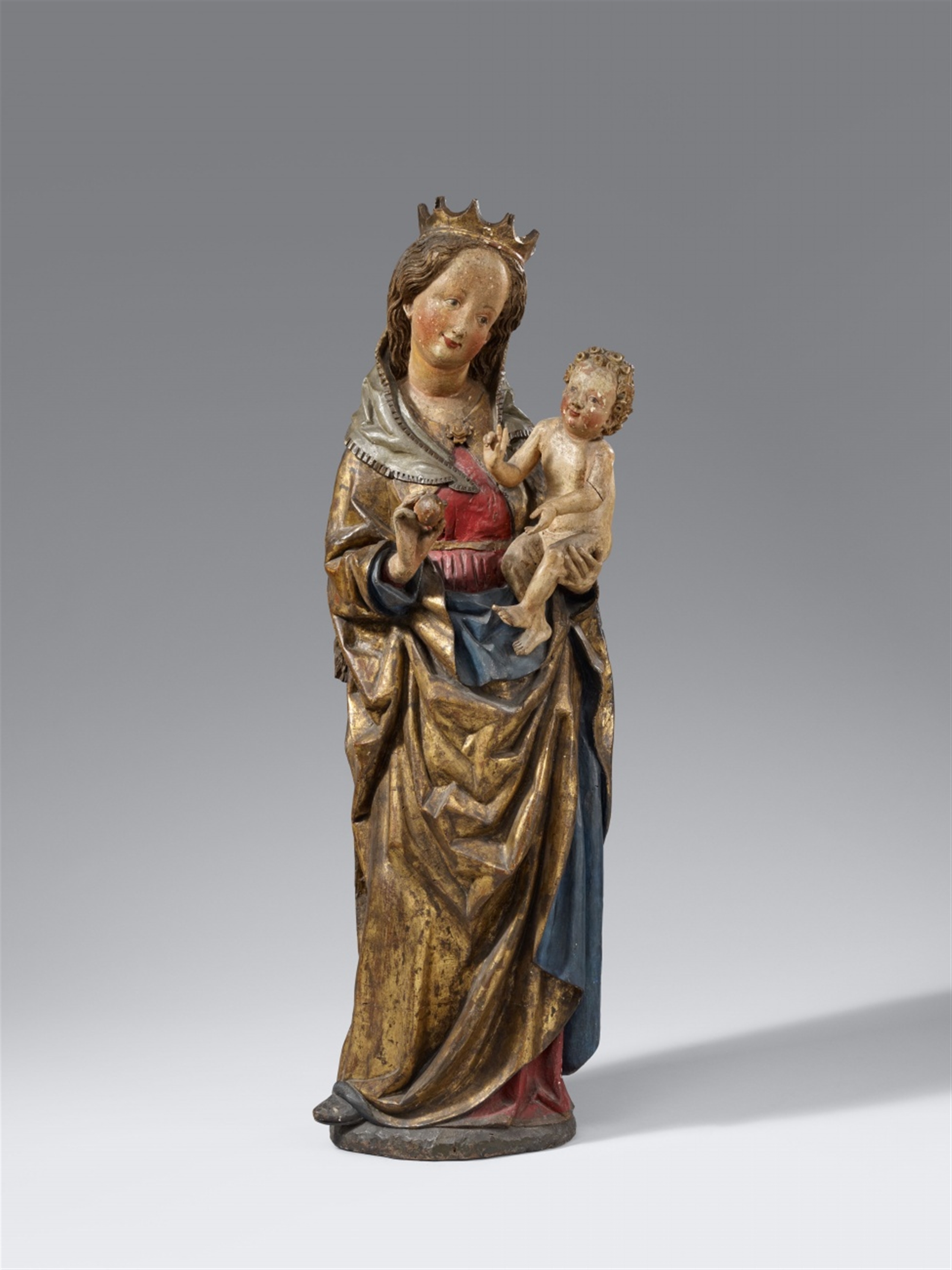 A carved wooden figure of the Virgin and Child, probably Bohemian ...