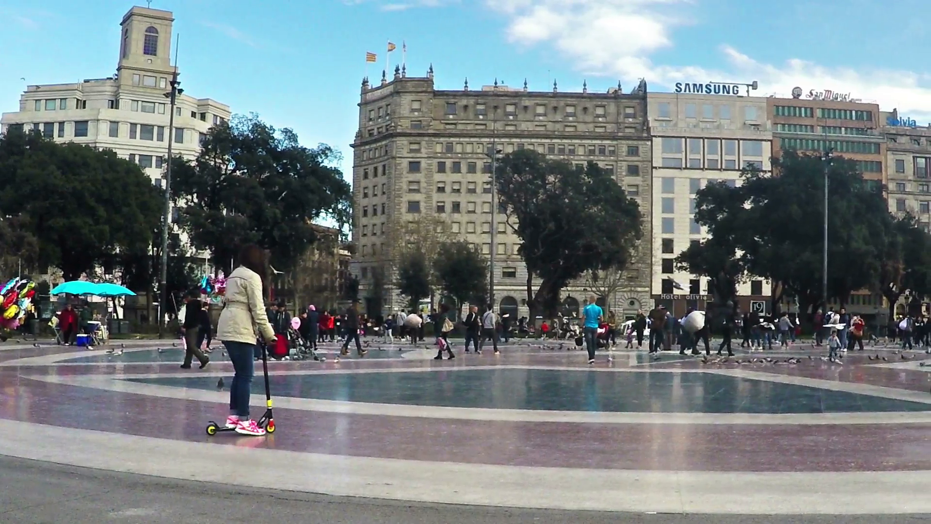 Pan of people at Catalonia Square by day Stock Video Footage ...