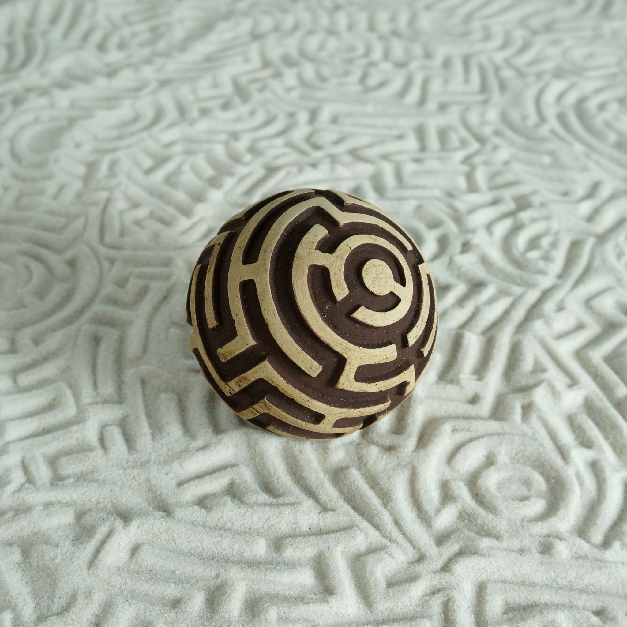 The Maze is A-Mazing! Corny puns aside, this sphere has a real maze ...