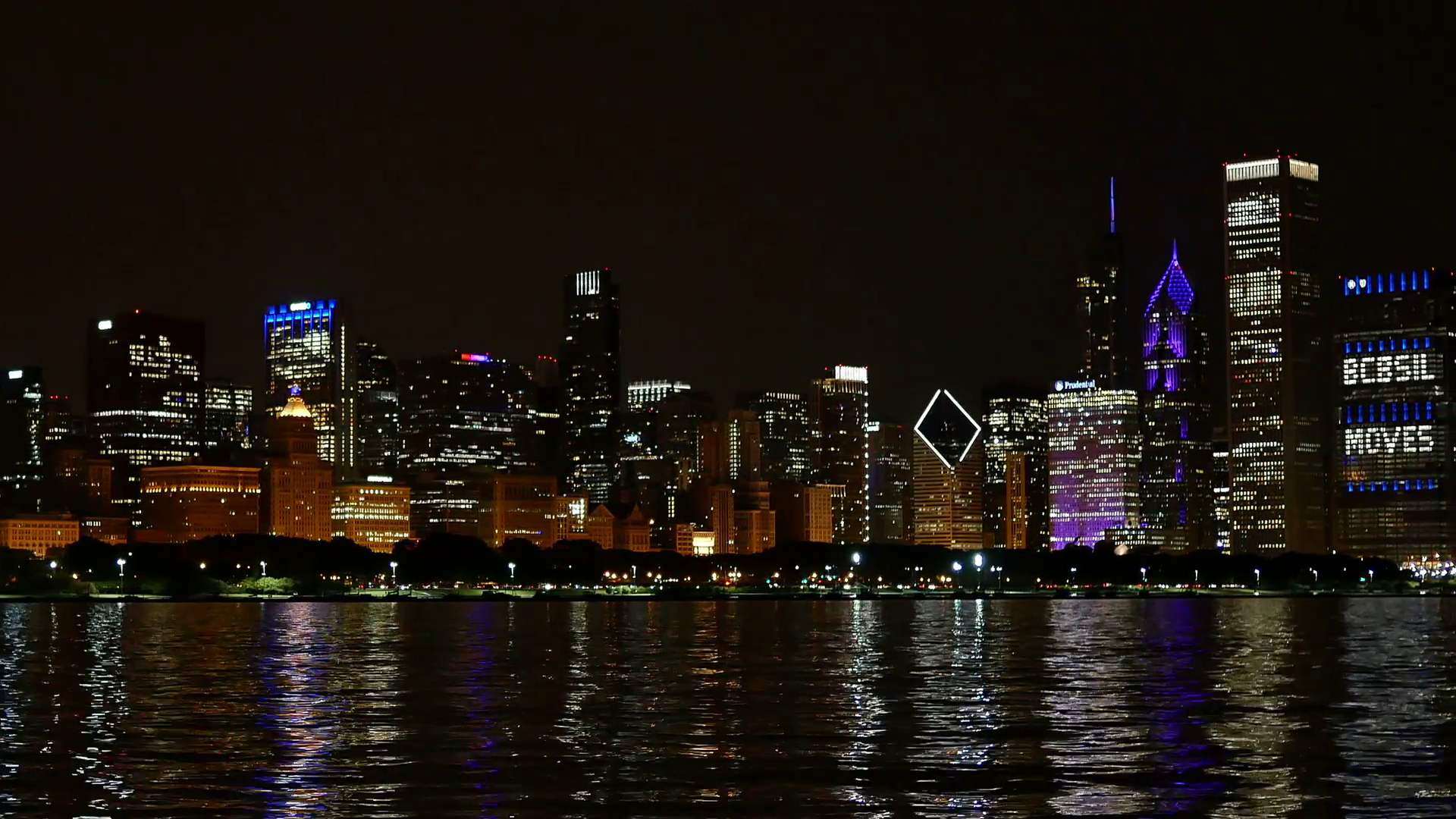 Chicago Skyline Reflected on the Lake at Night. Chicago downtown ...