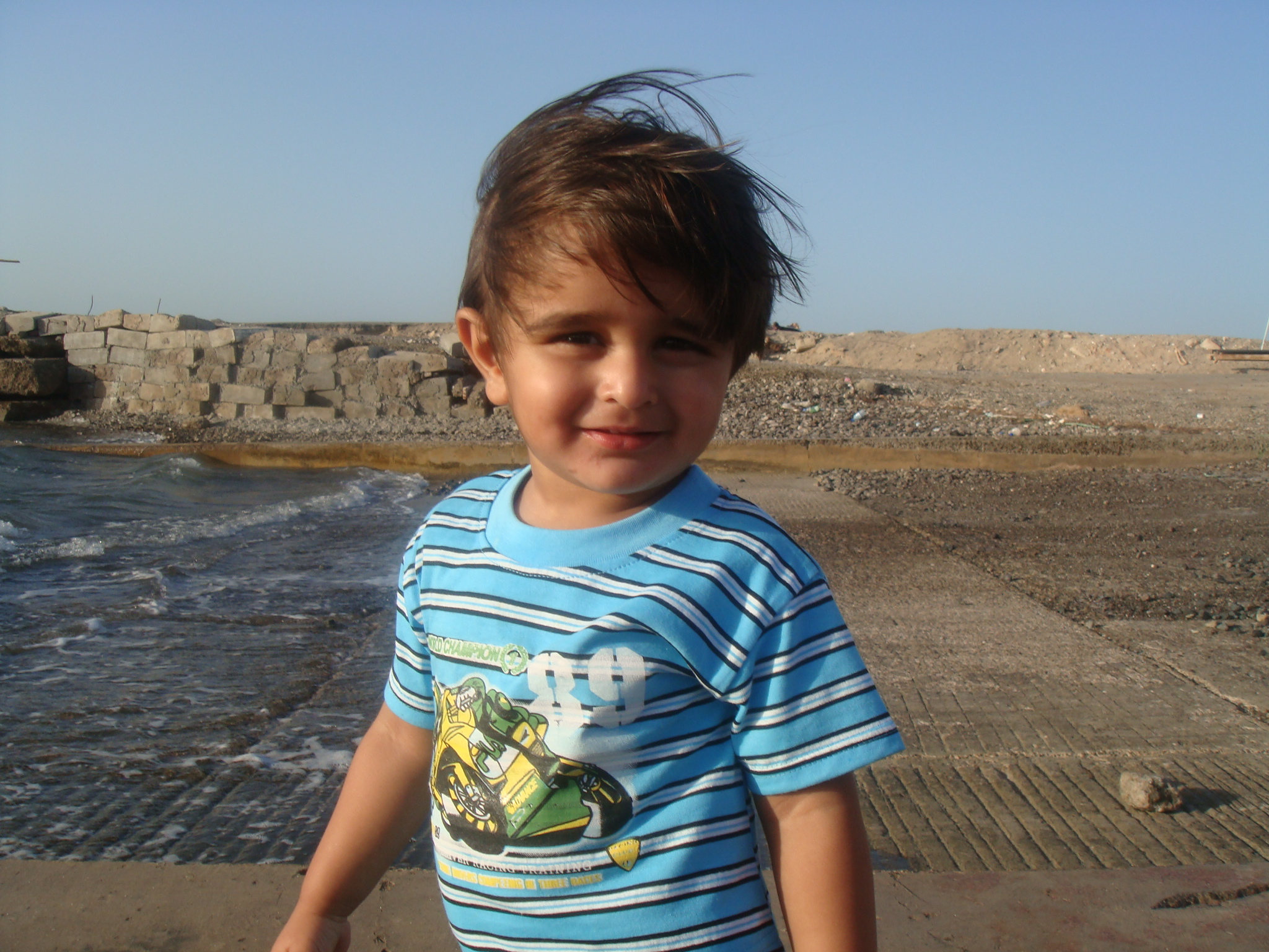 Child at the beach photo