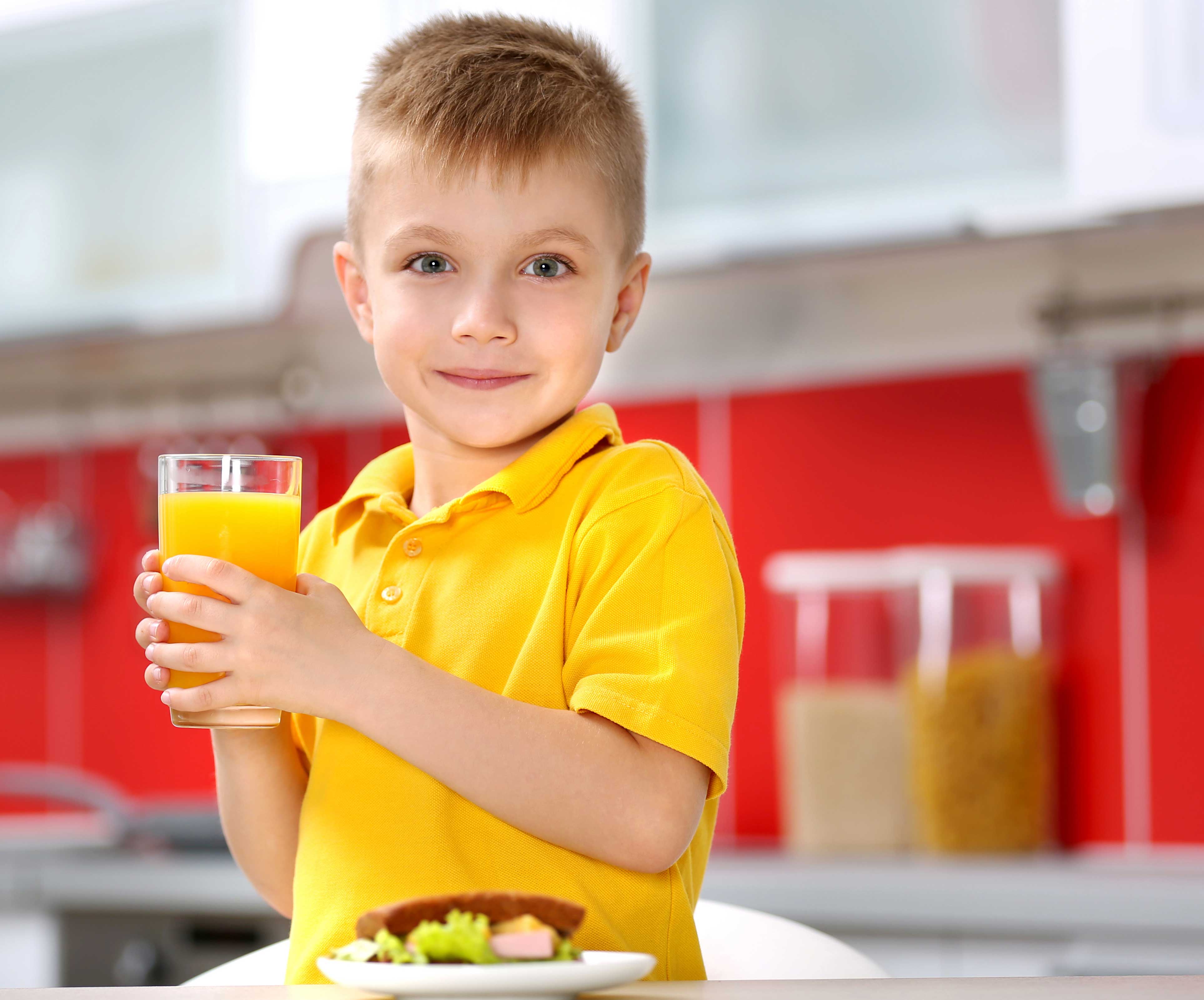 Child drinking juice photo