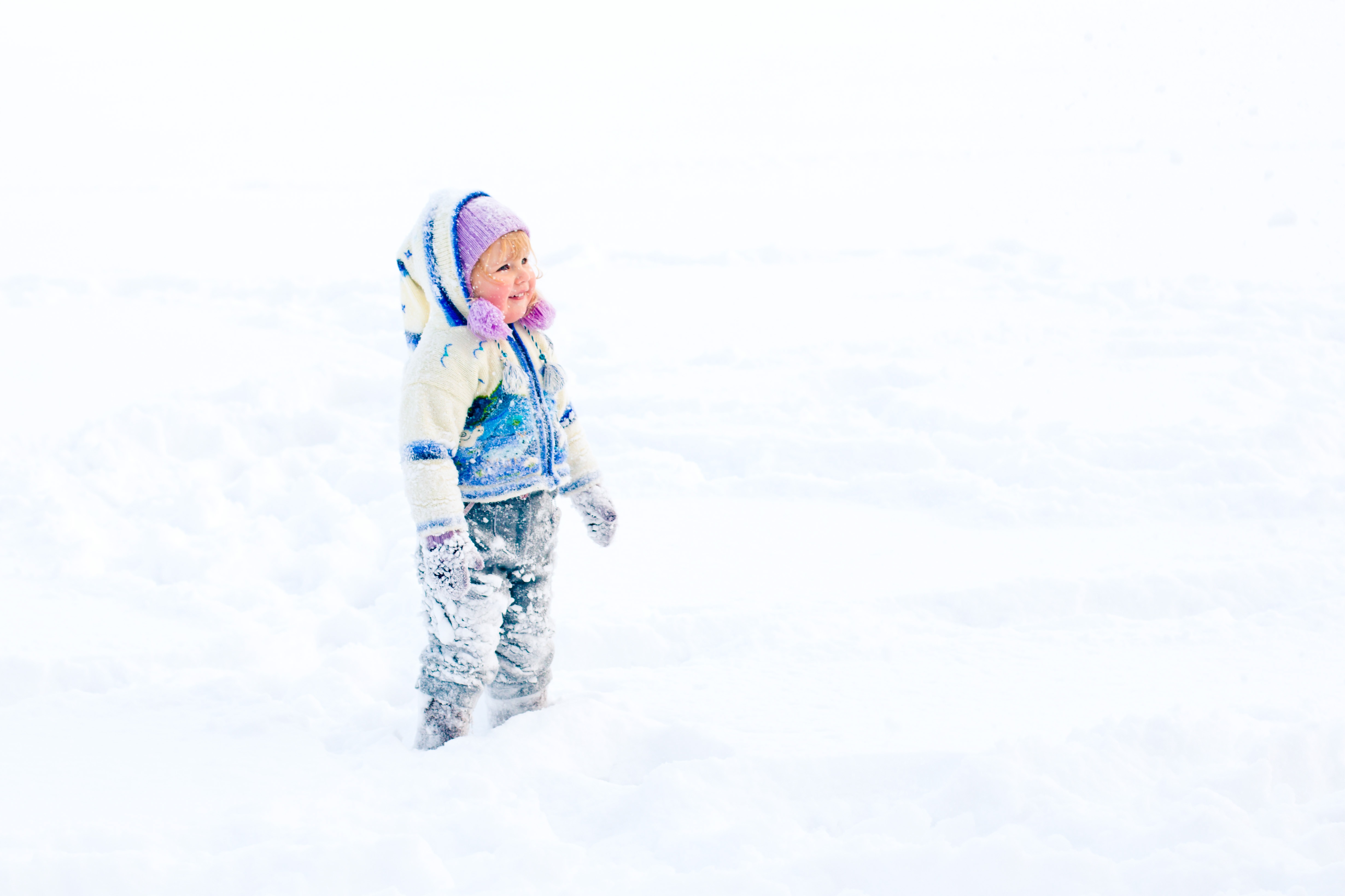 Child playing in winter photo
