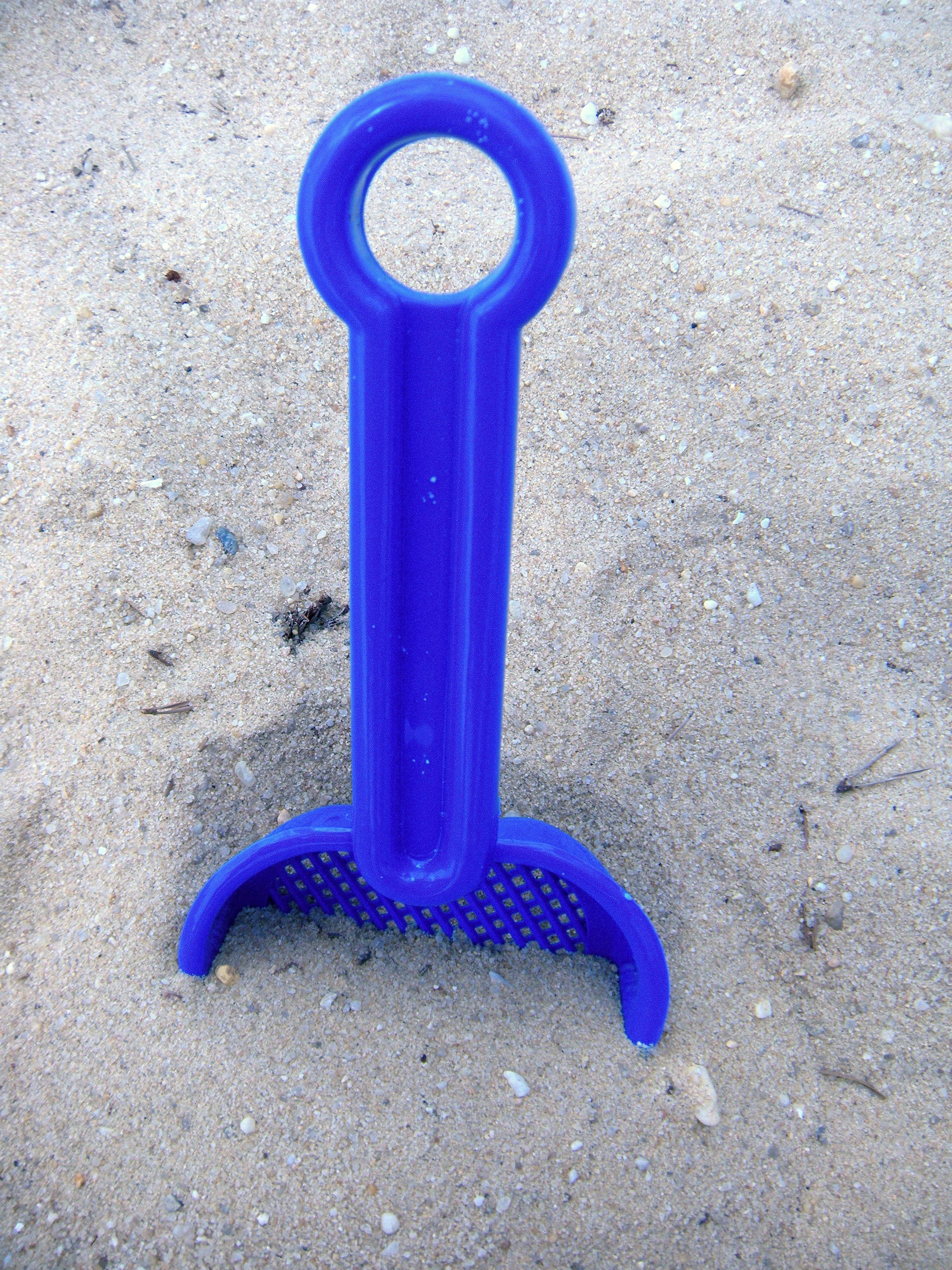 Child's blue shovel photo