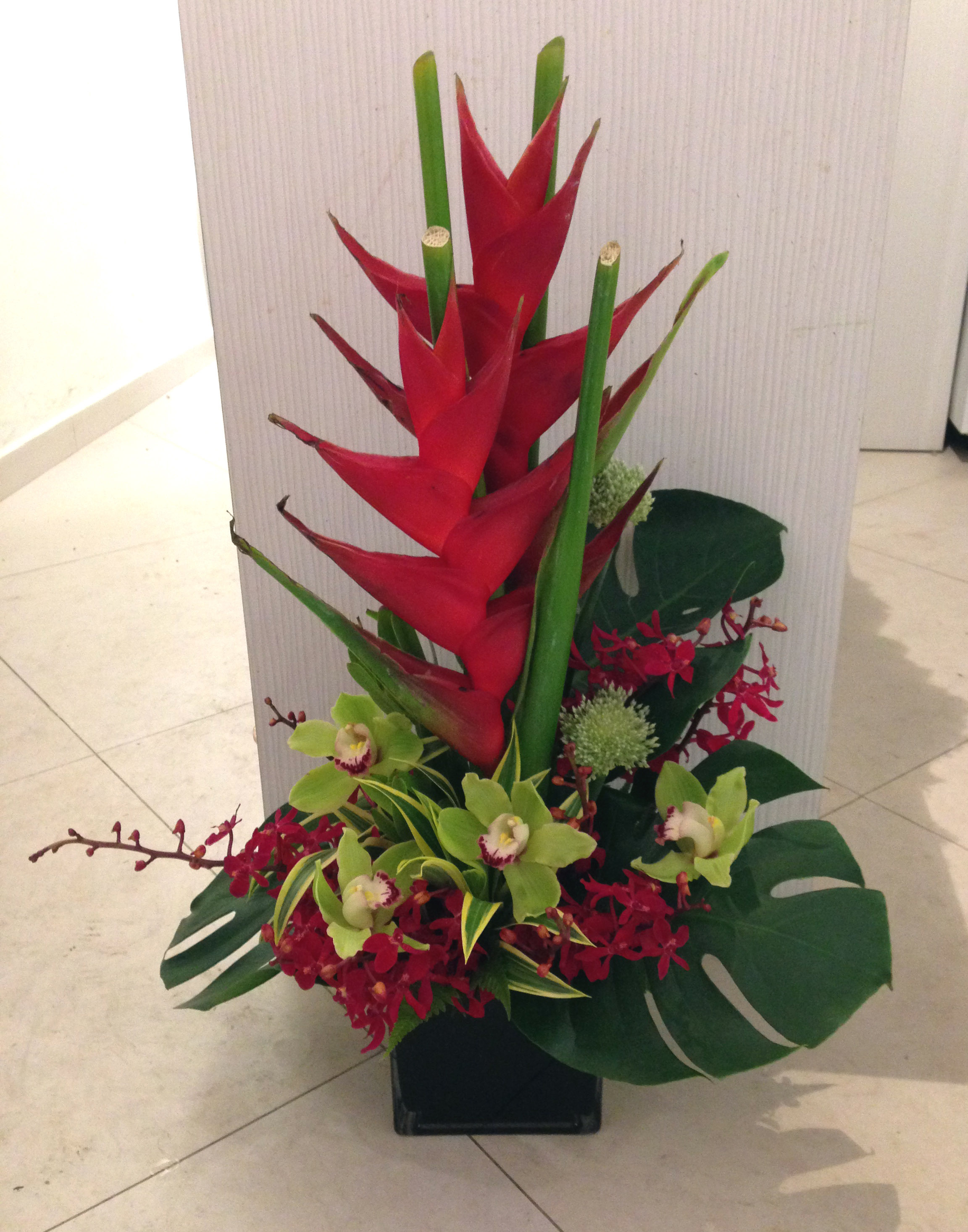 Flower arrangement to beautify the office | Blossoms Cellar Florist