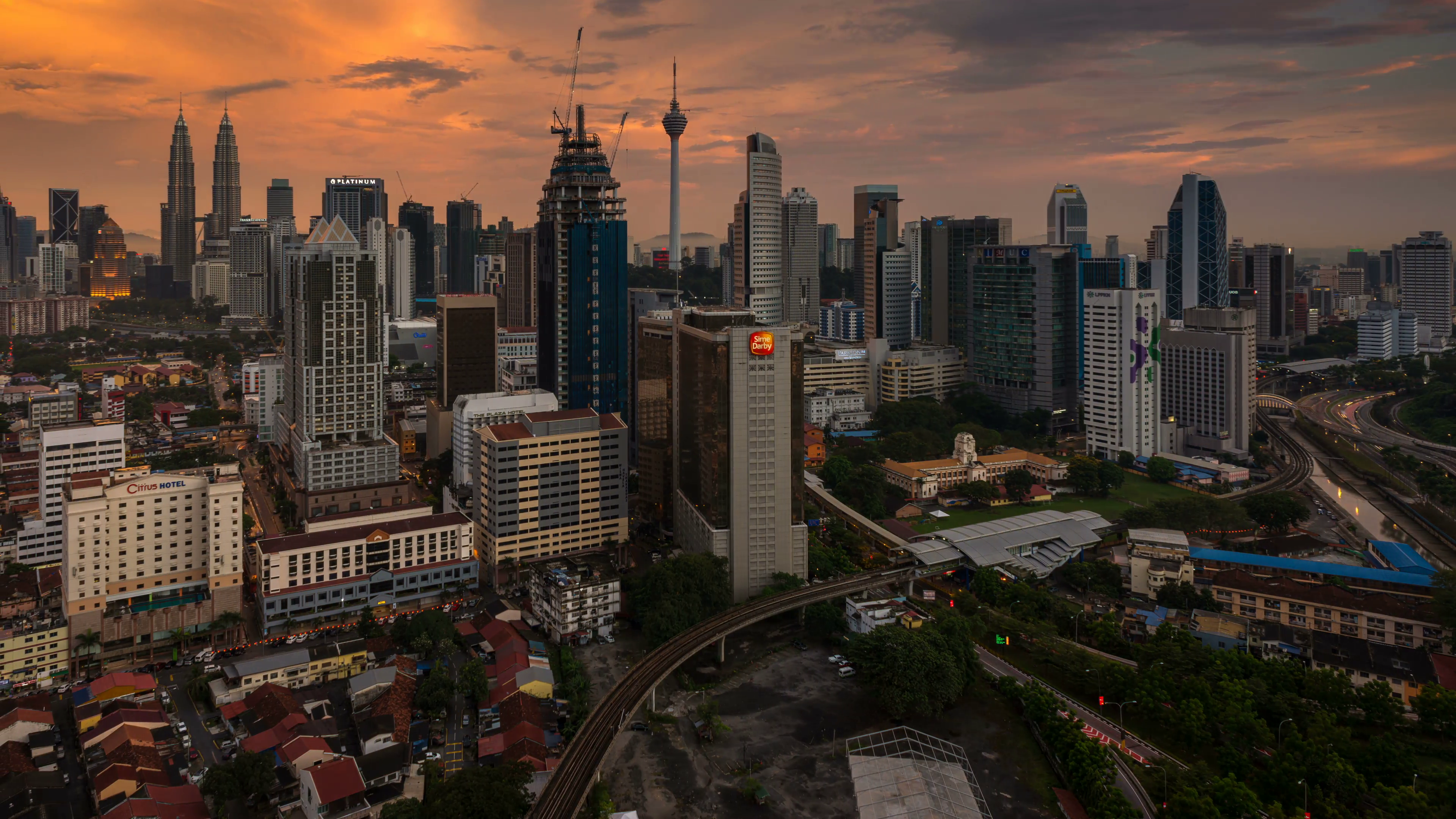 Sunset time lapse at Kuala Lumpur CIty Center. High angle view of ...