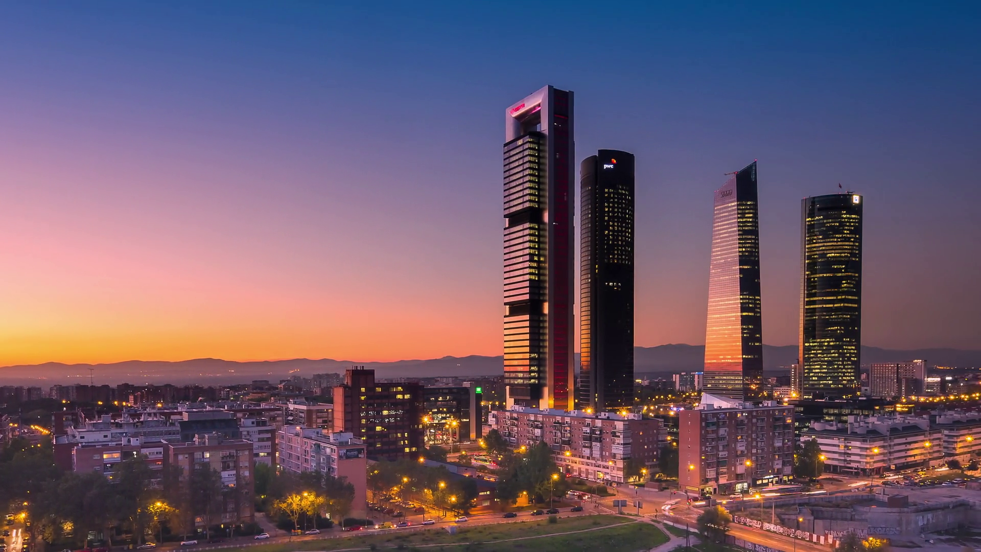 madrid city skyline timelapse from day to night aerial view of four ...