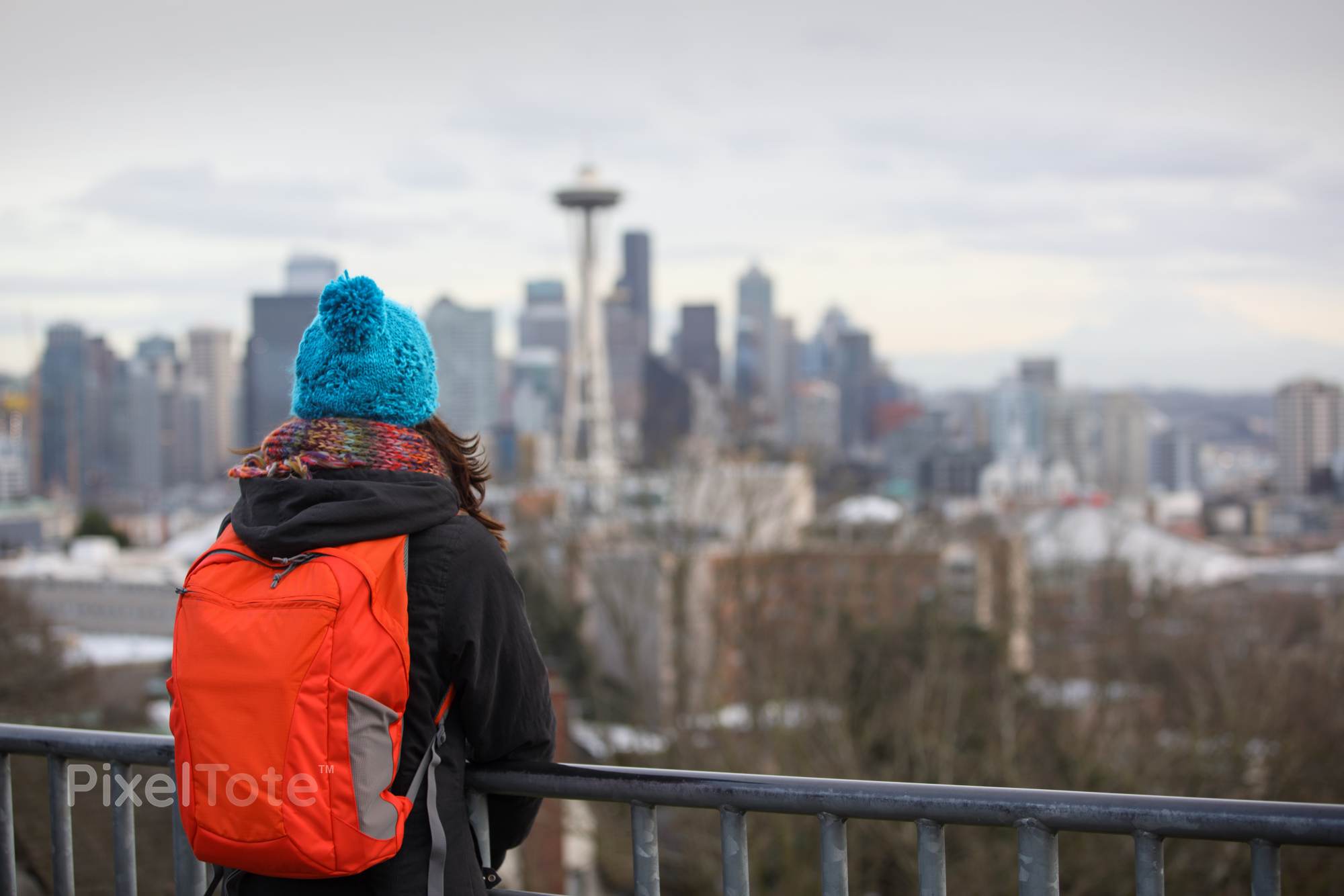 Girl with a Backpack Looking at Seattle Cityscape Before the Dusk ...