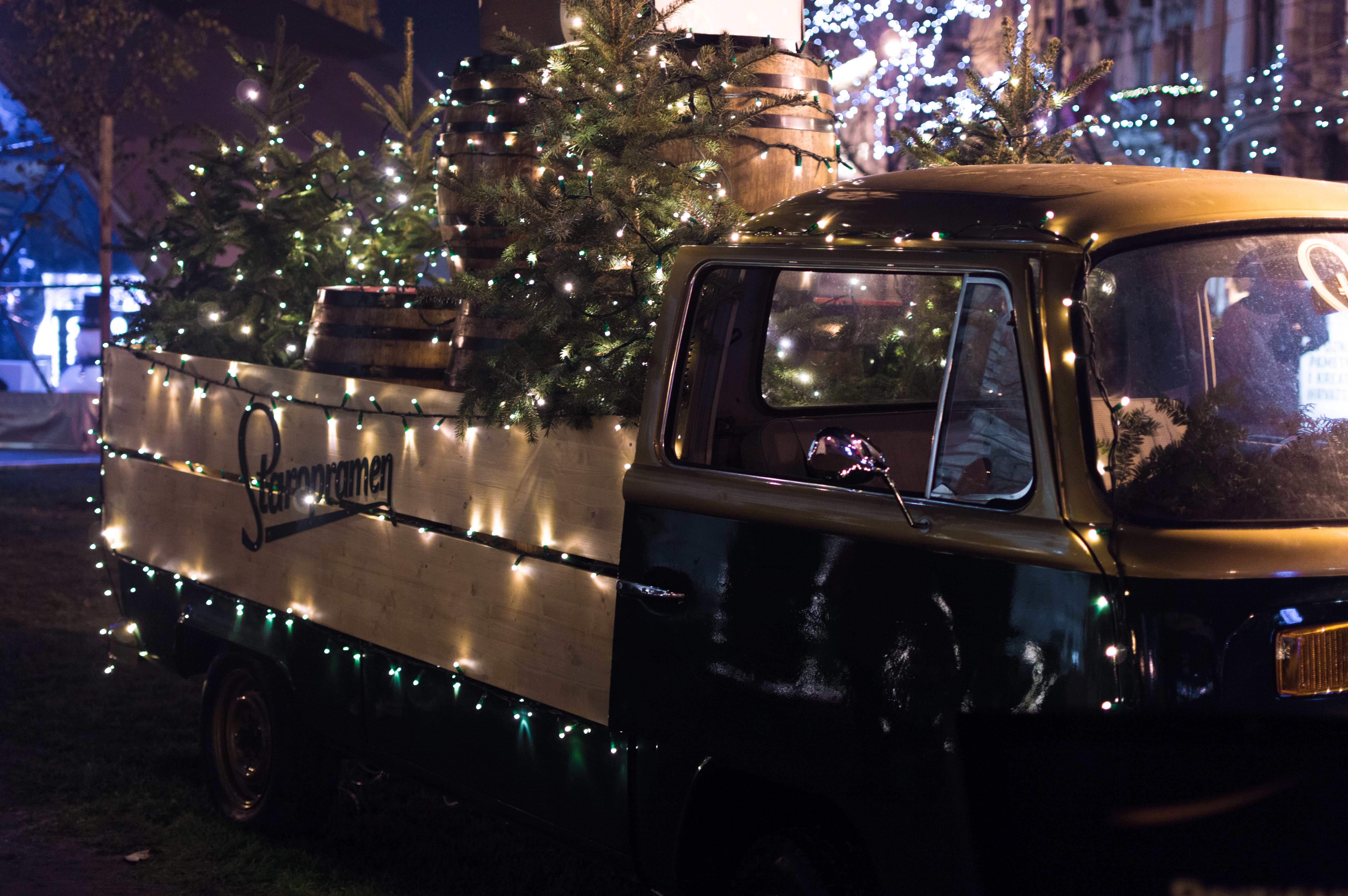 Classic brown single-cab truck with christmas tree photo