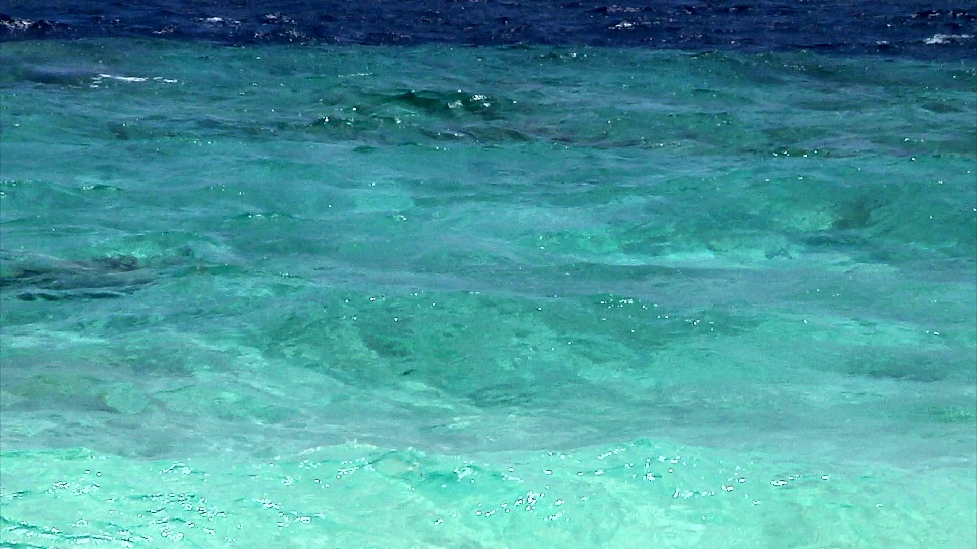 Clear Ocean Water. Crystal clear Indian Ocean waters lap onto a ...