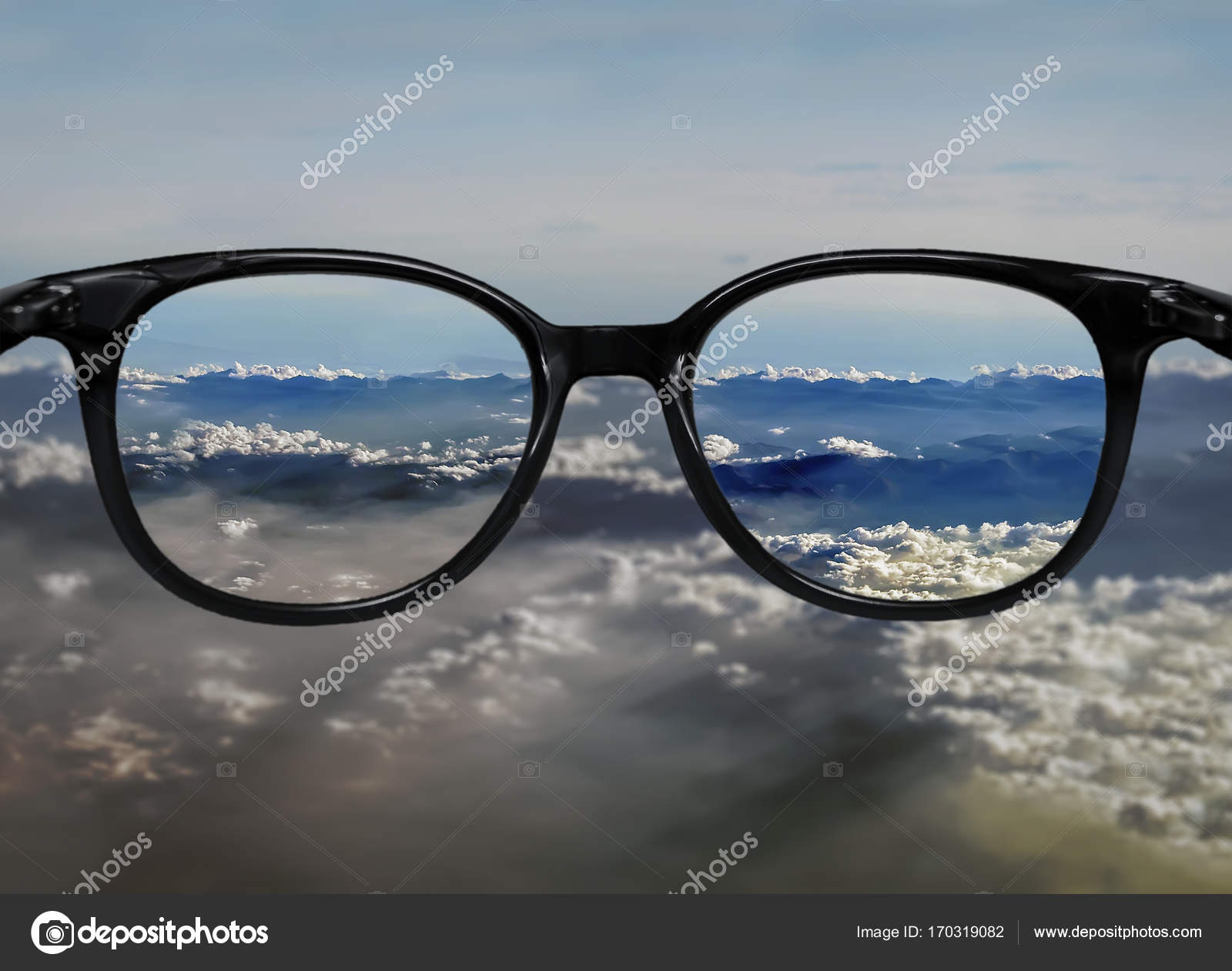Clear vision through glasses on blue clouds landscape — Stock Photo ...