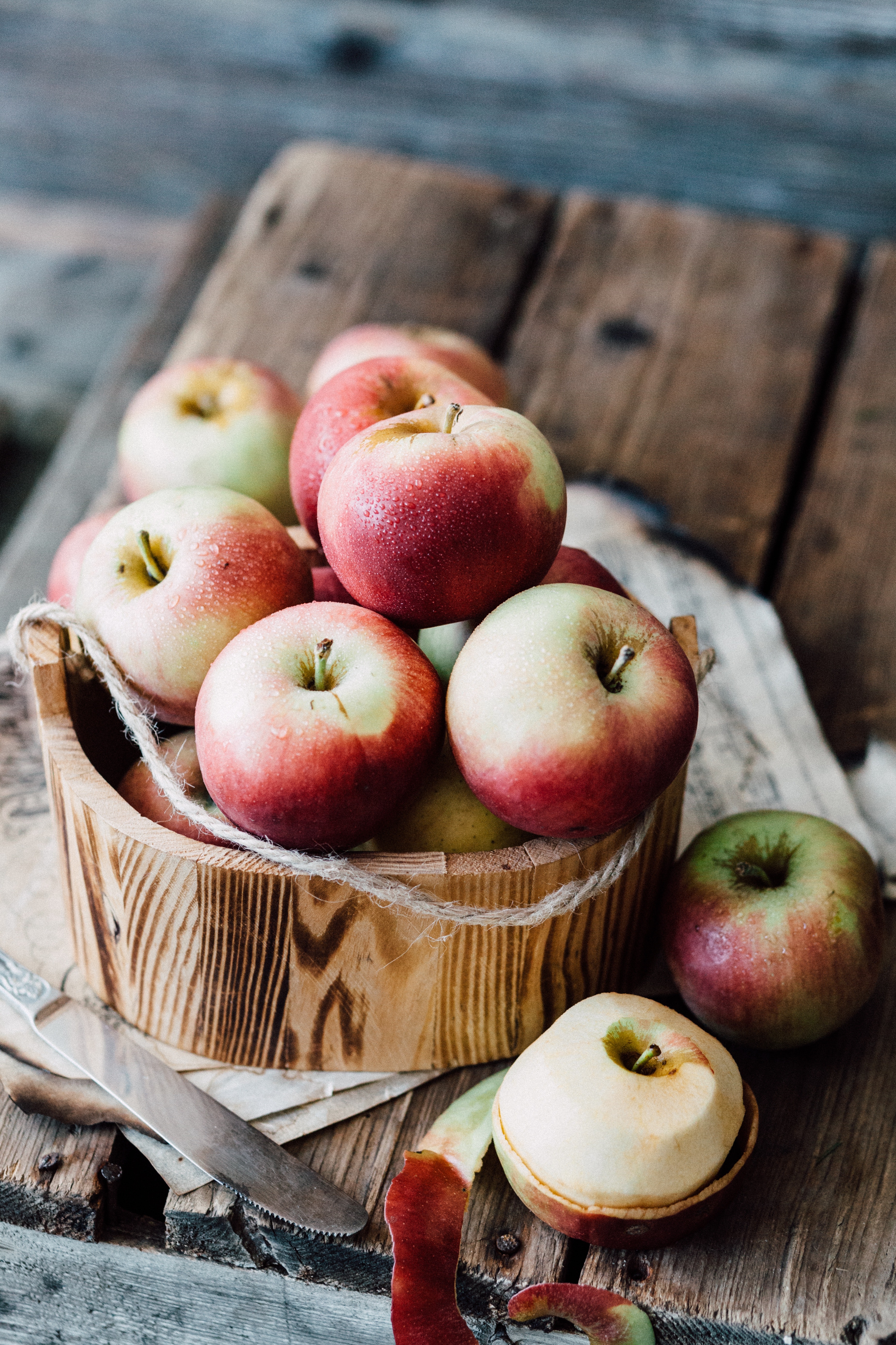 Close-up of apples in wooden bowl photo