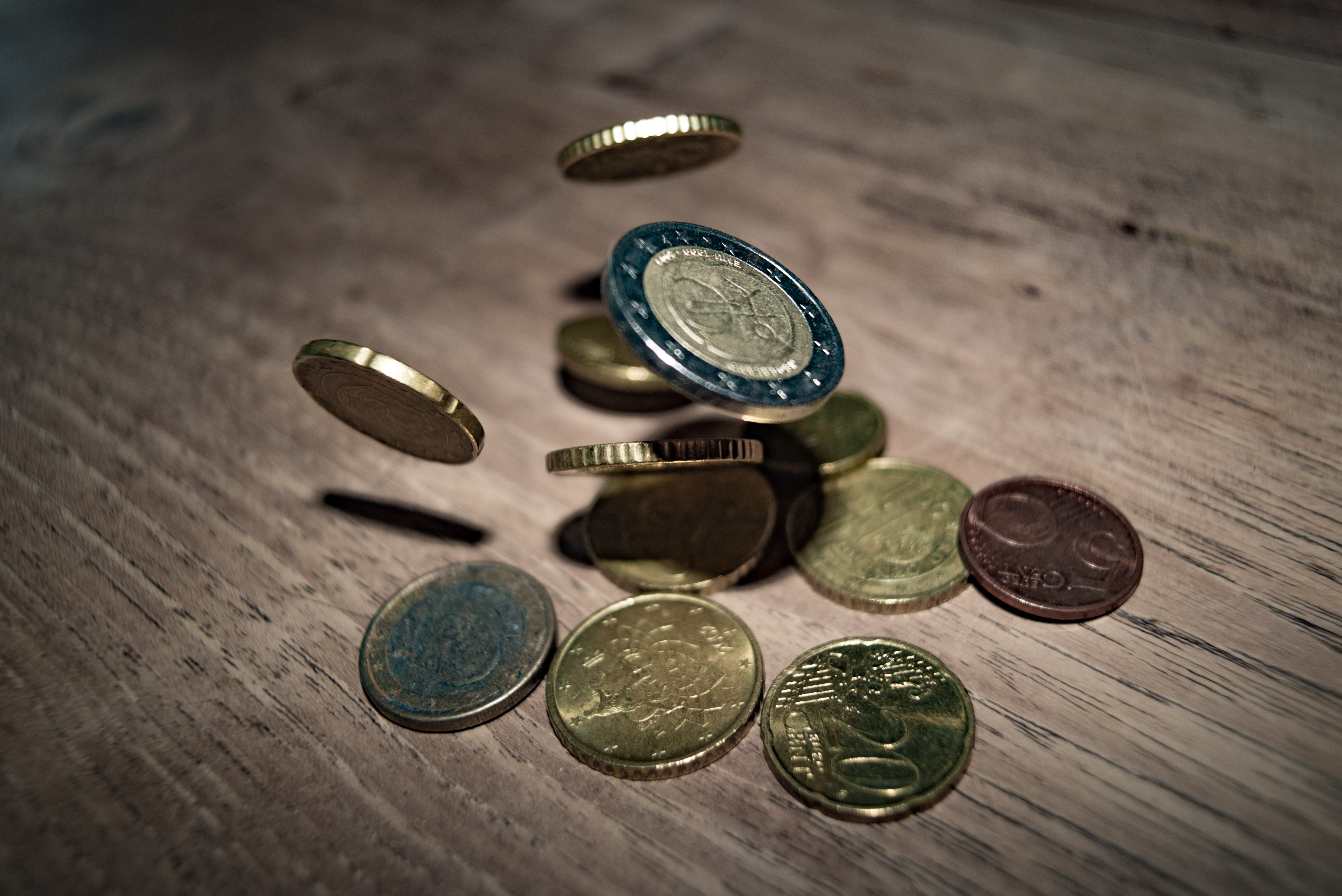Close-up of coins on table photo